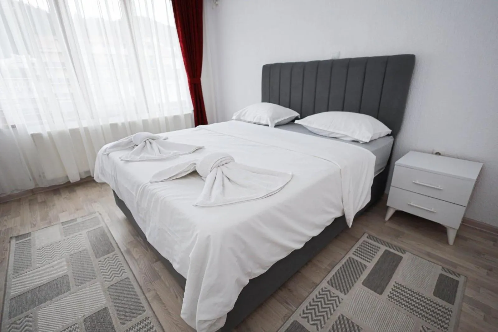 Bed in Family Hotel Alex