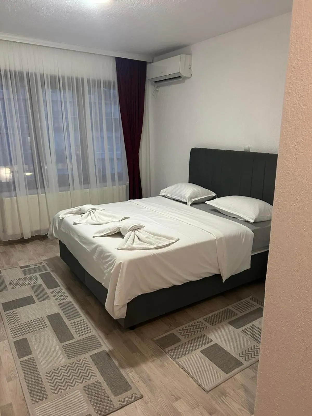 Bed in Family Hotel Alex