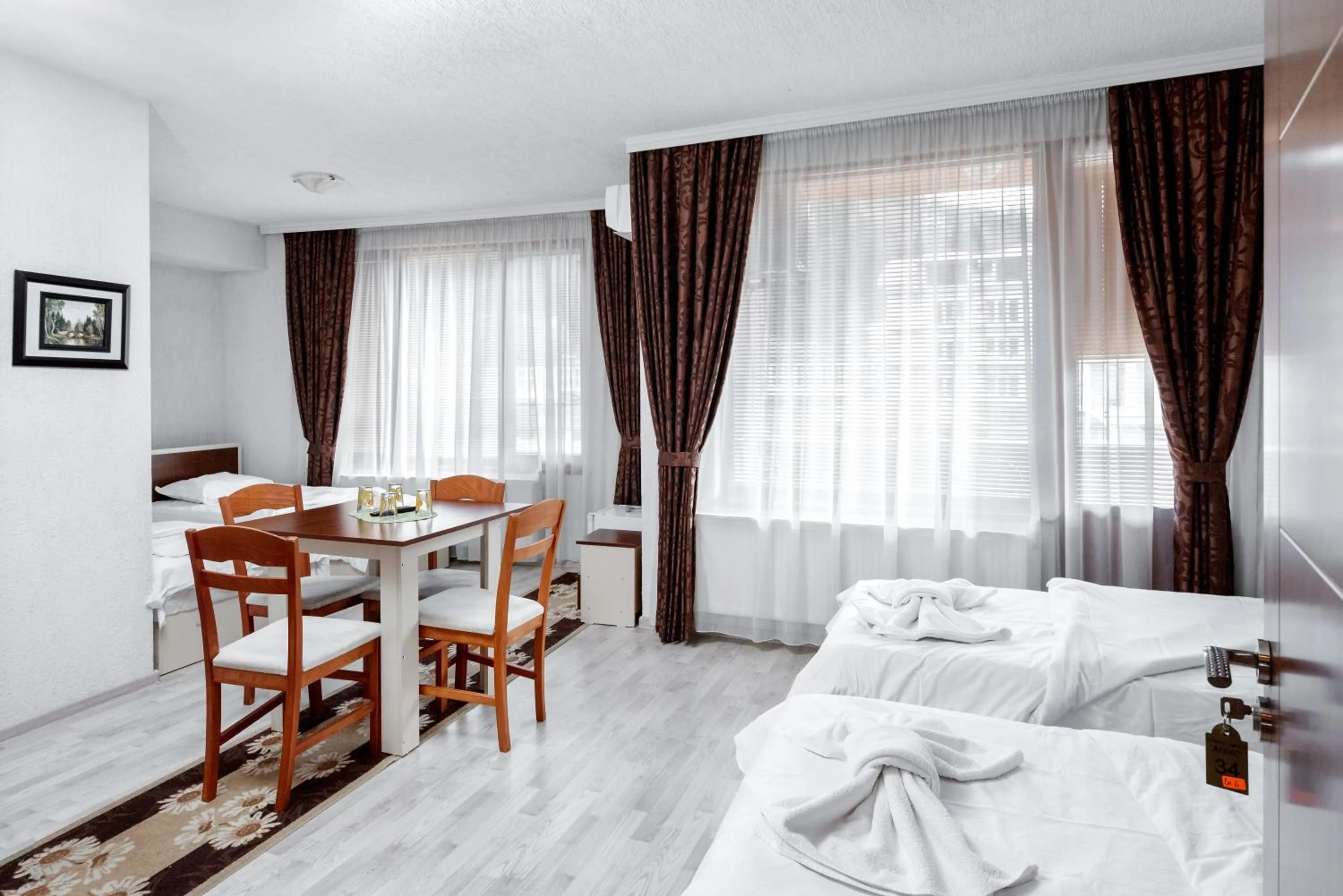 Bed in Family Hotel Alex