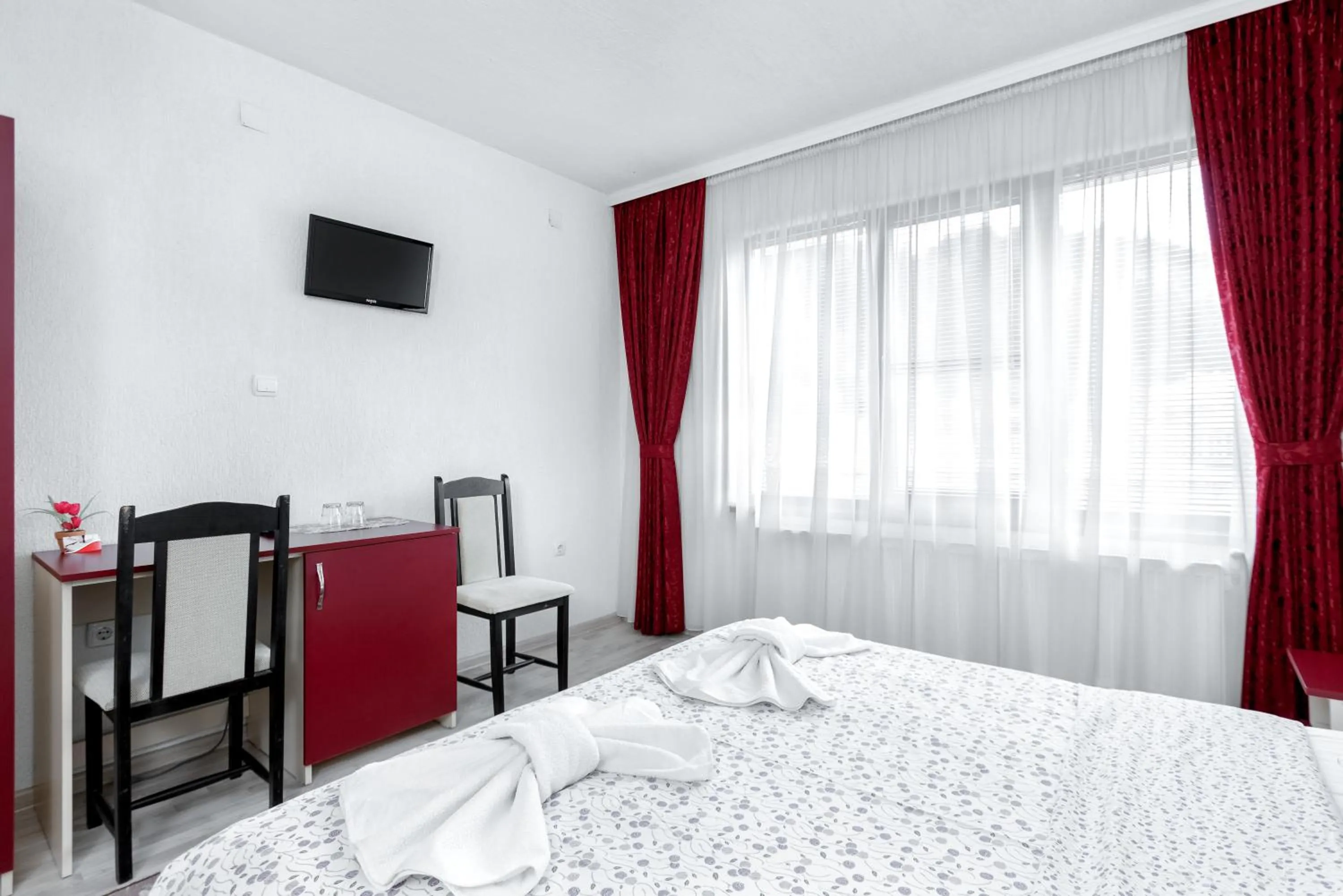 Bed in Family Hotel Alex