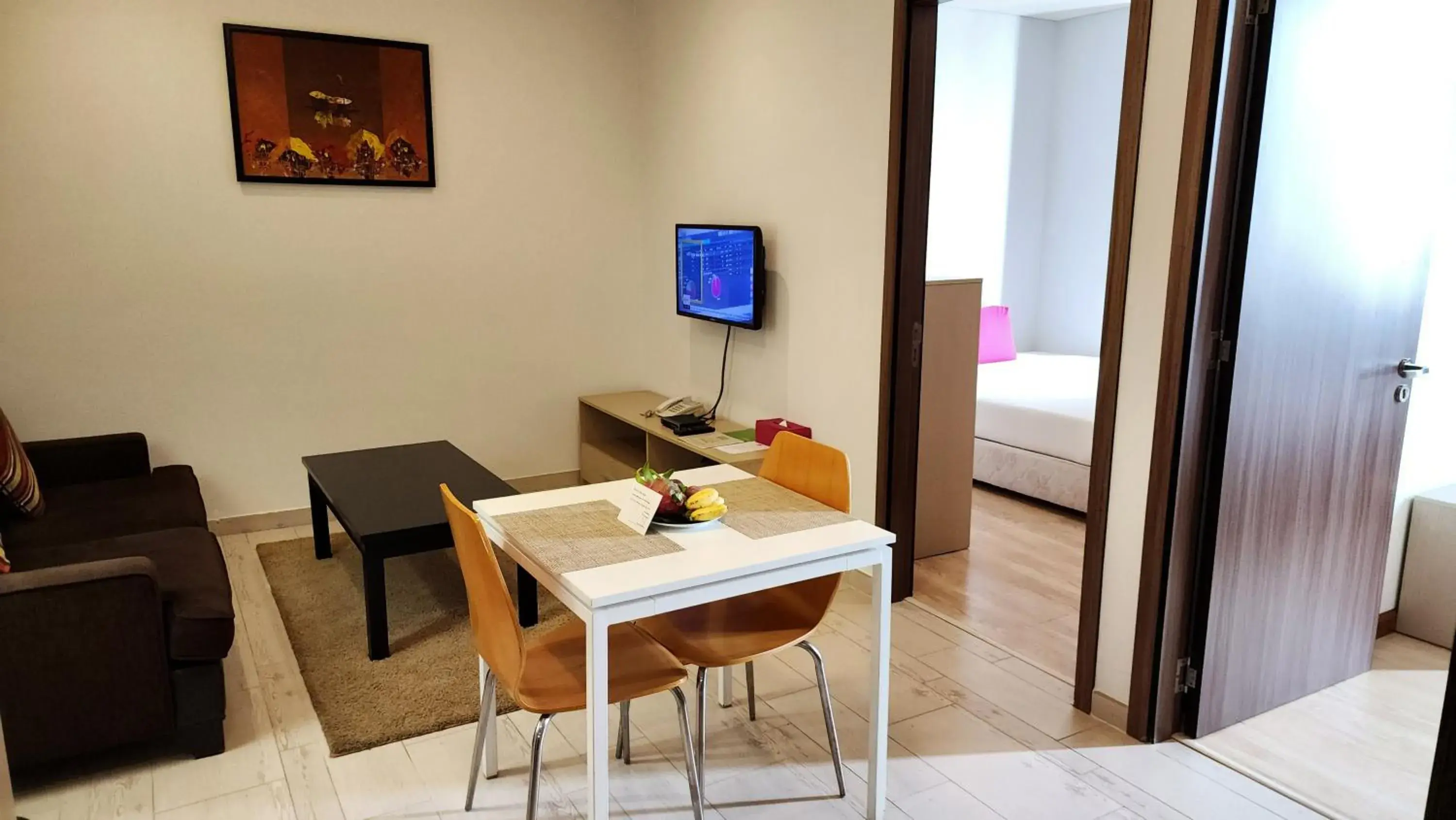 Living room in ÊMM Hotel Saigon Living room in ÊMM Hotel Saigon