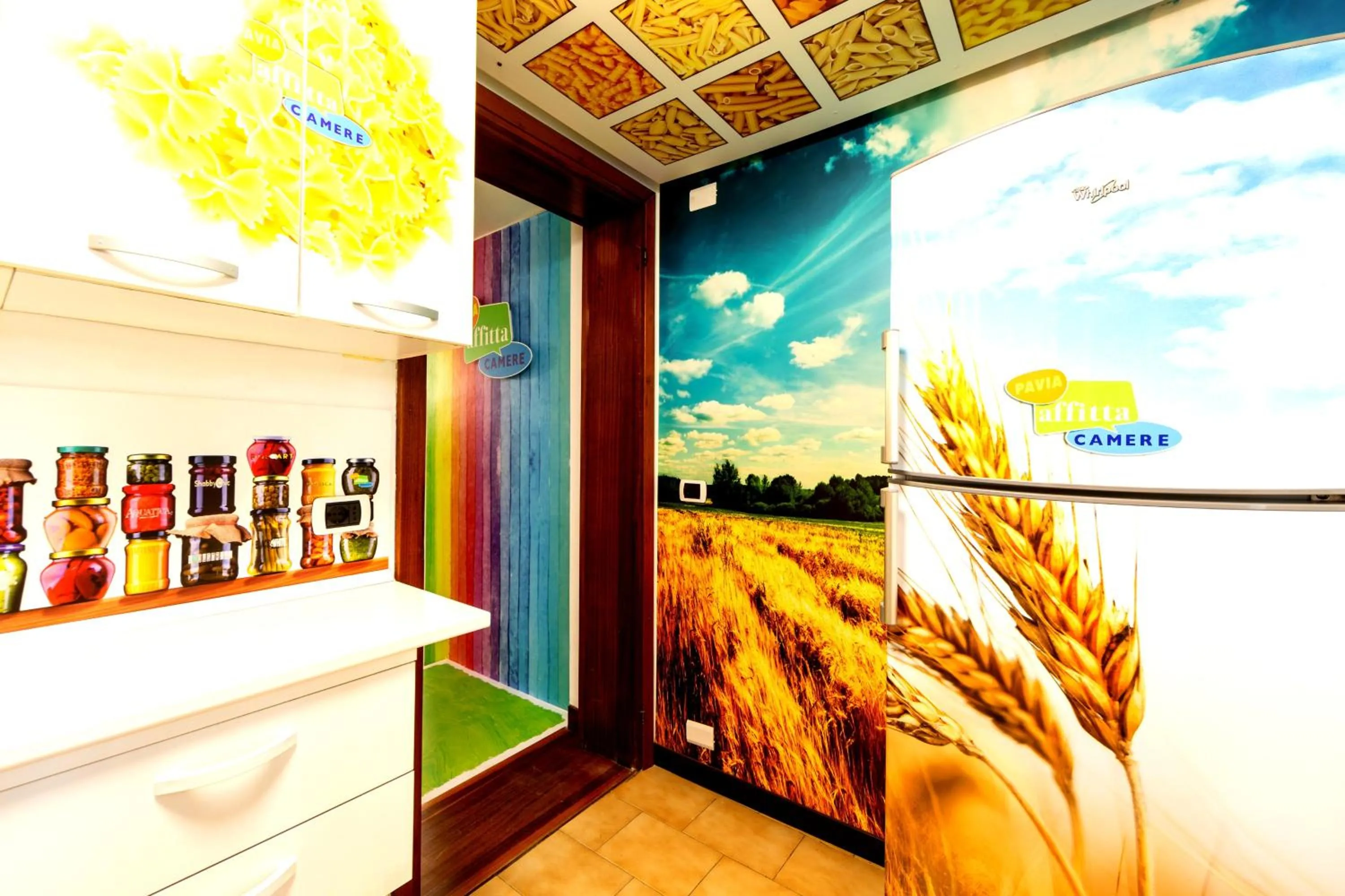 Communal kitchen in Affittacamere Pavia