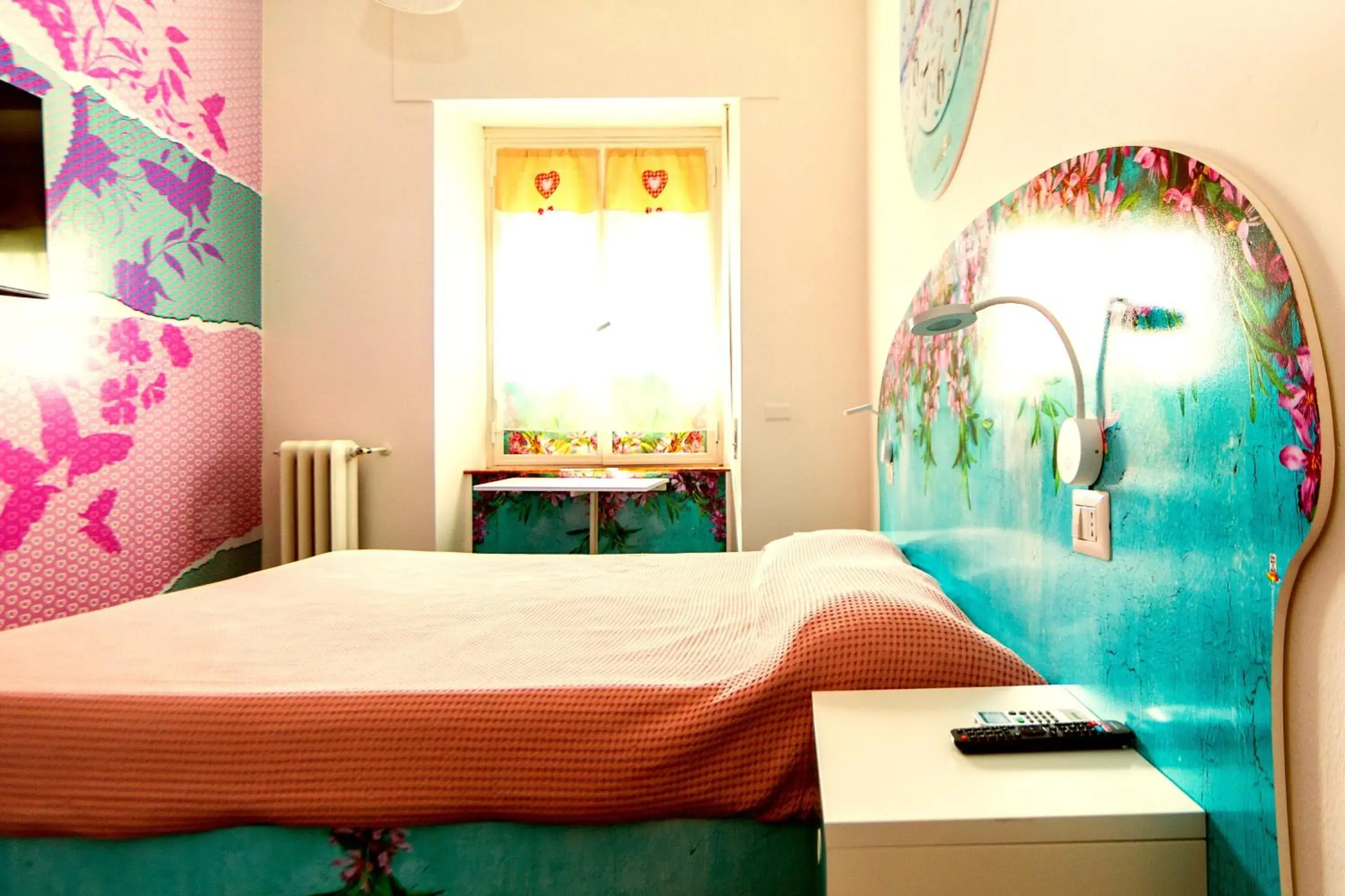 Decorative detail, Bed in Affittacamere Pavia Decorative detail, Bed in Affittacamere Pavia