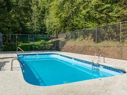 Pool view in Barenberg Cabin - Secluded Unobstructed Panoramic Smoky Mountains View with Two Master Suites, Loft Game Room, and Hot Tub