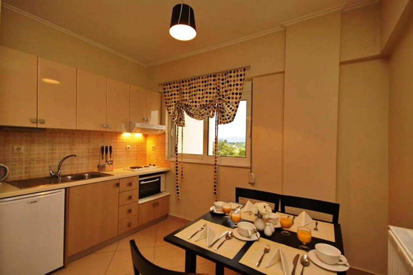 kitchen in Palatino Rooms & Apartments