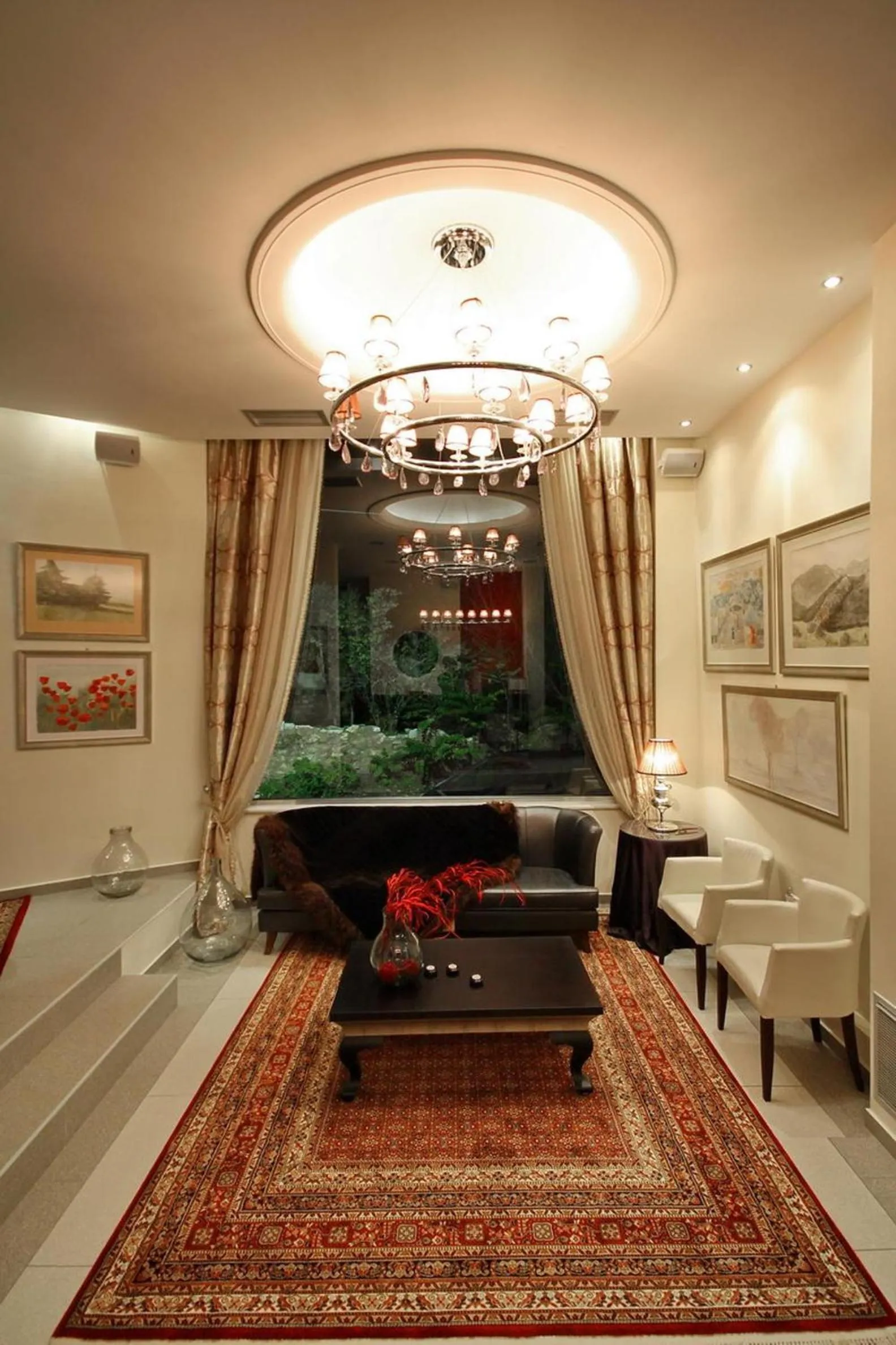 Communal lounge/ TV room in Palatino Rooms & Apartments