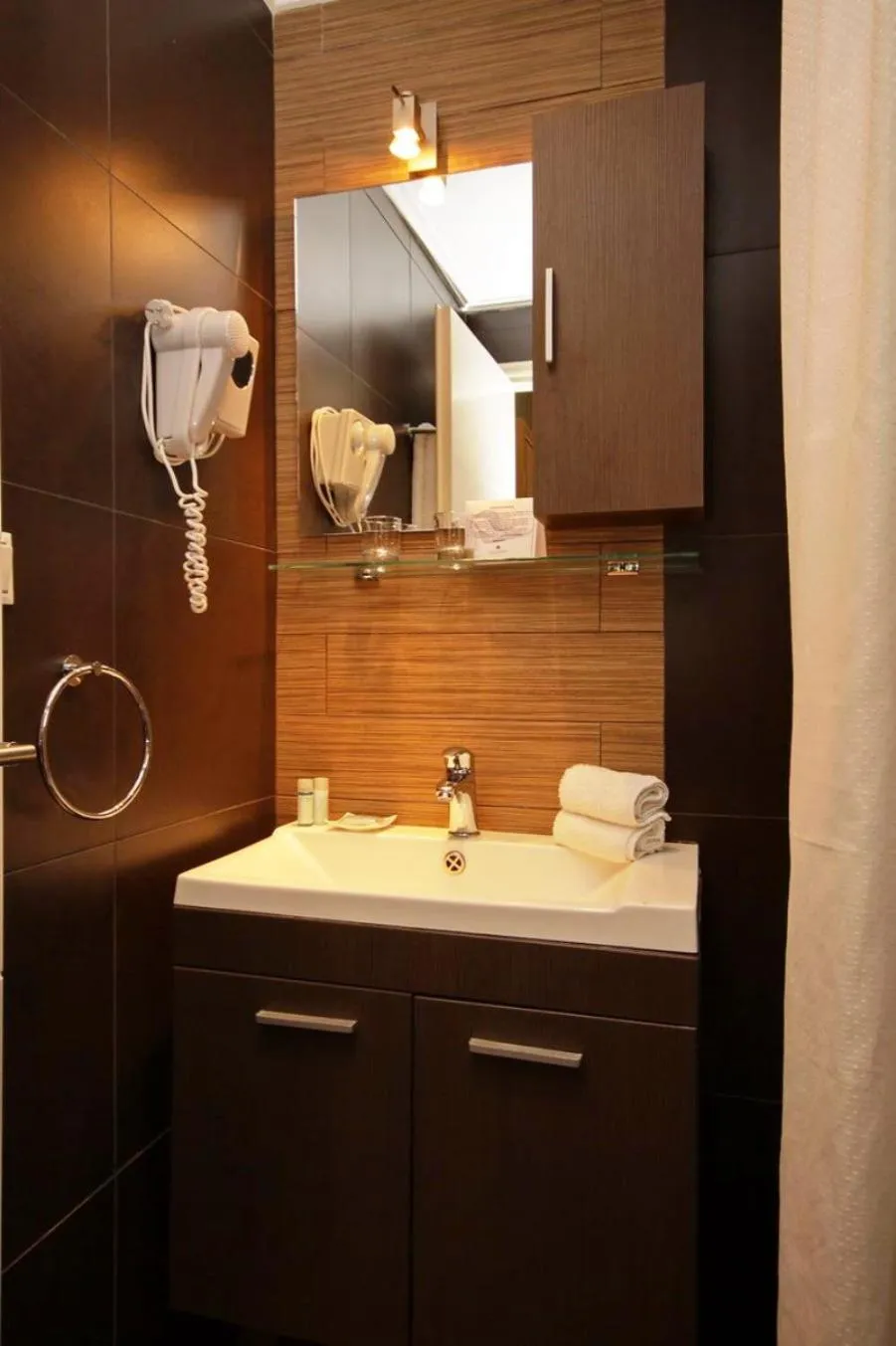 Bathroom in Palatino Rooms & Apartments