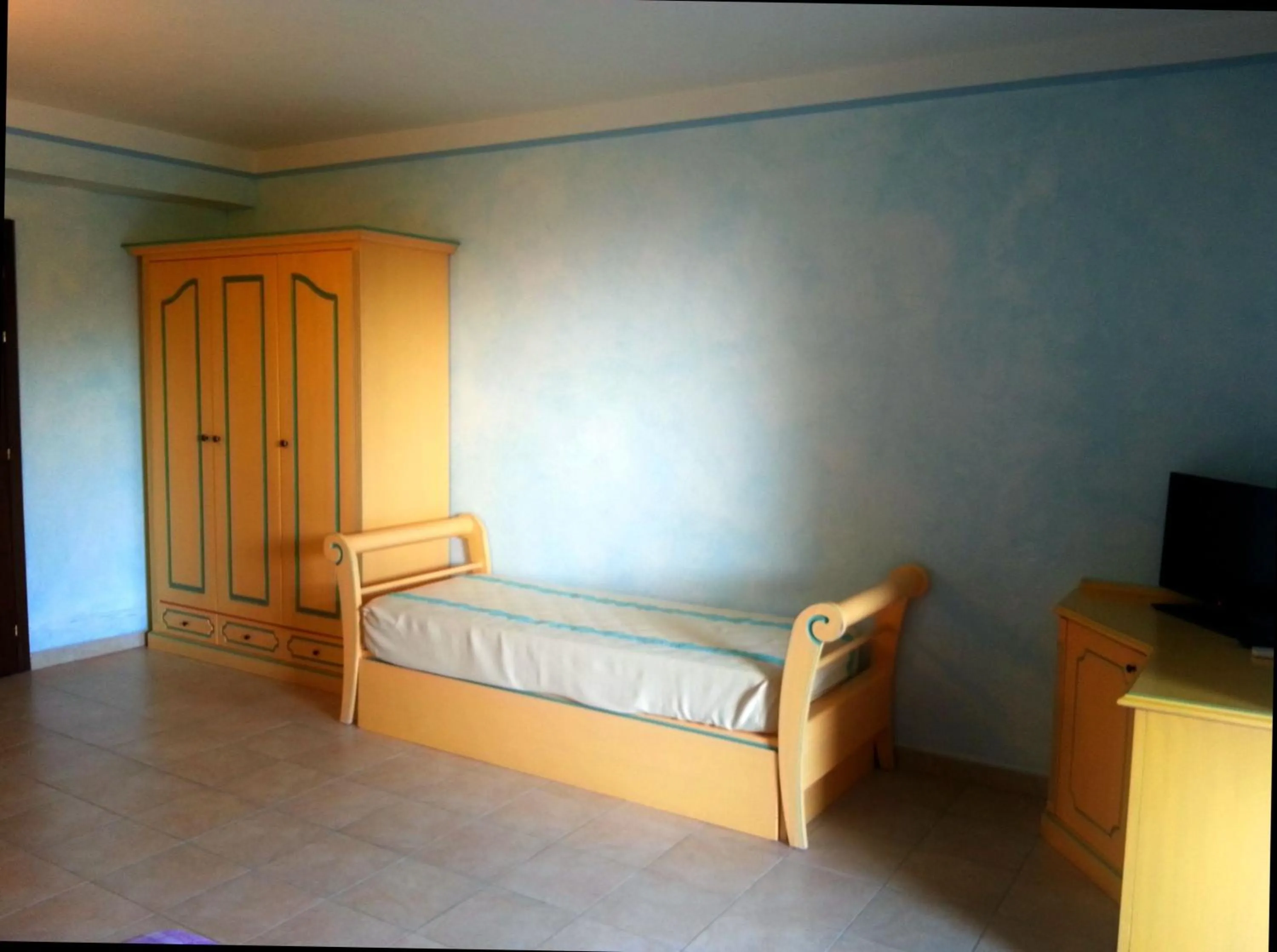 Decorative detail, Bed in Residence Riva Azzurra