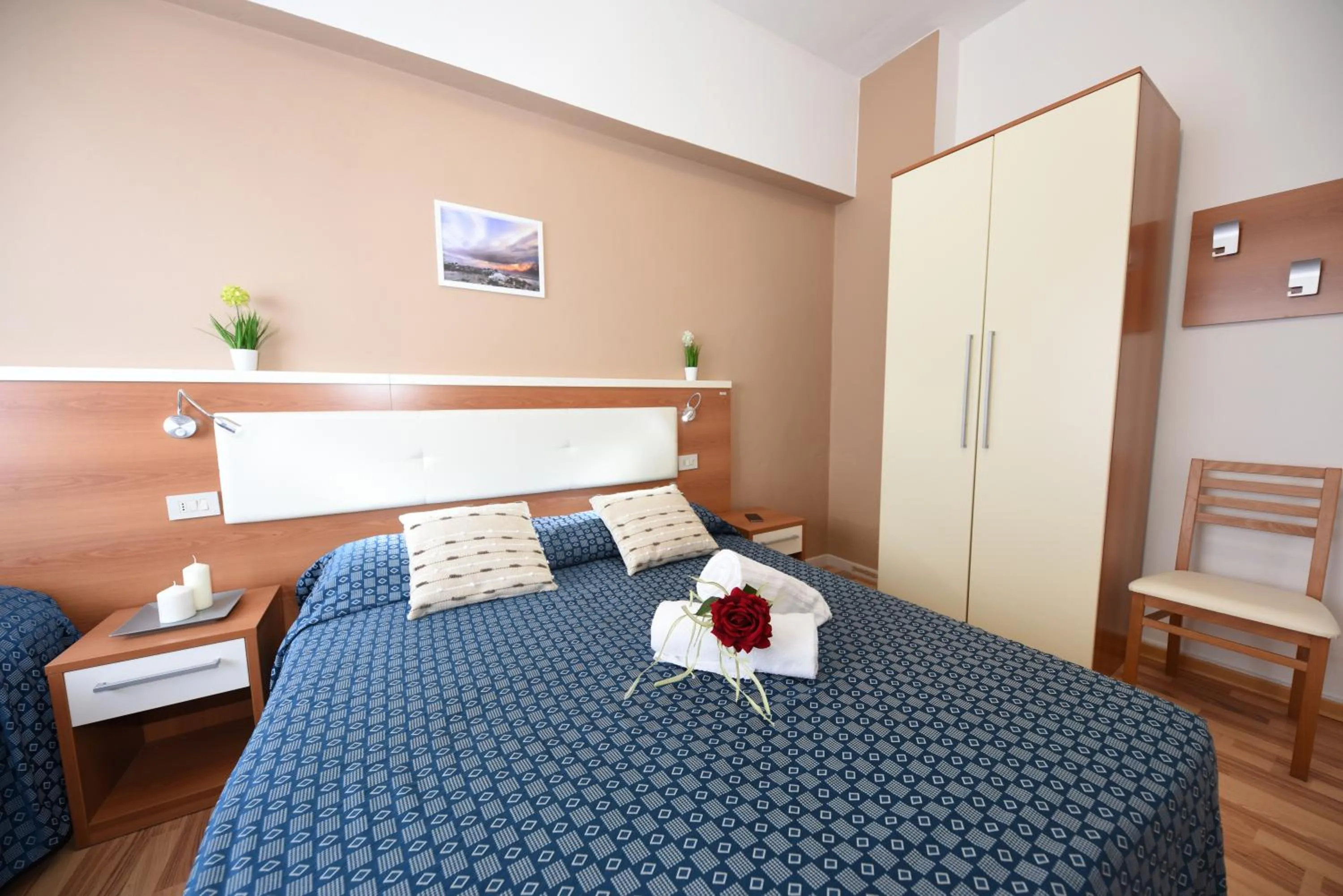 Bed in Miramare Inn Hotel