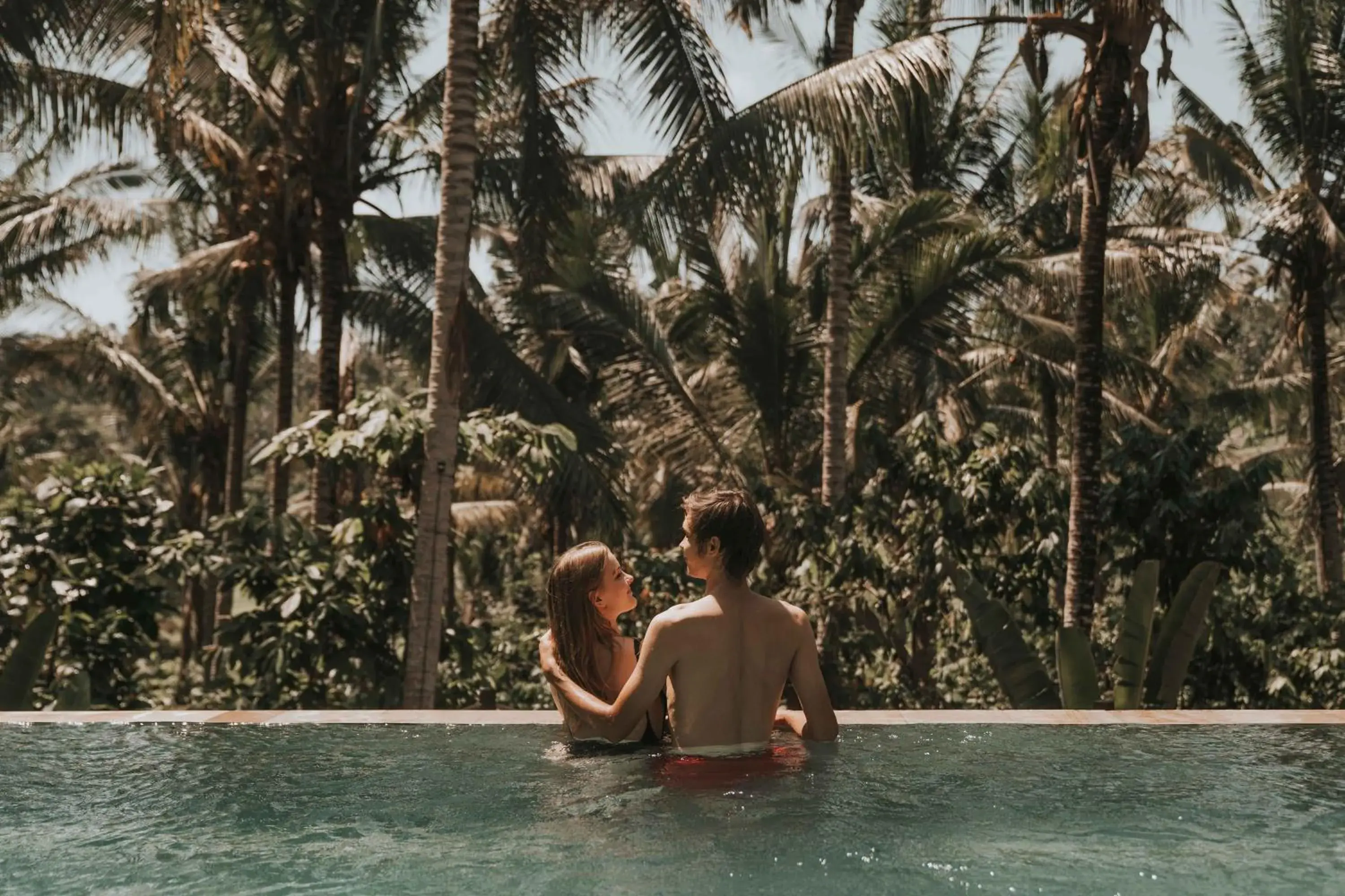 Swimming pool in Kusfarm Bali by AHM Swimming pool in Kusfarm Bali by AHM