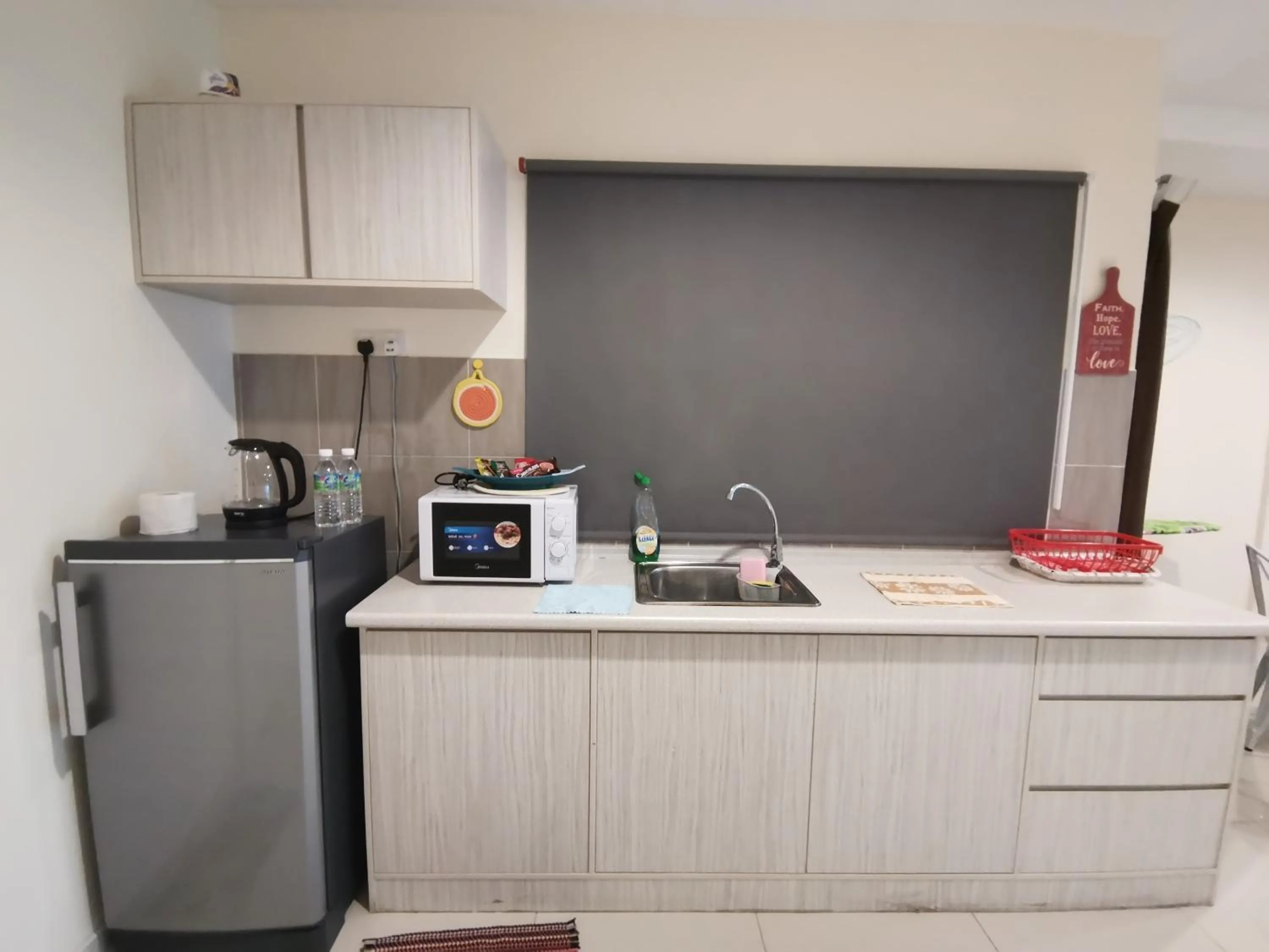 Peaceful 1-bedroom unit at Marina Island by JoMy Homestay