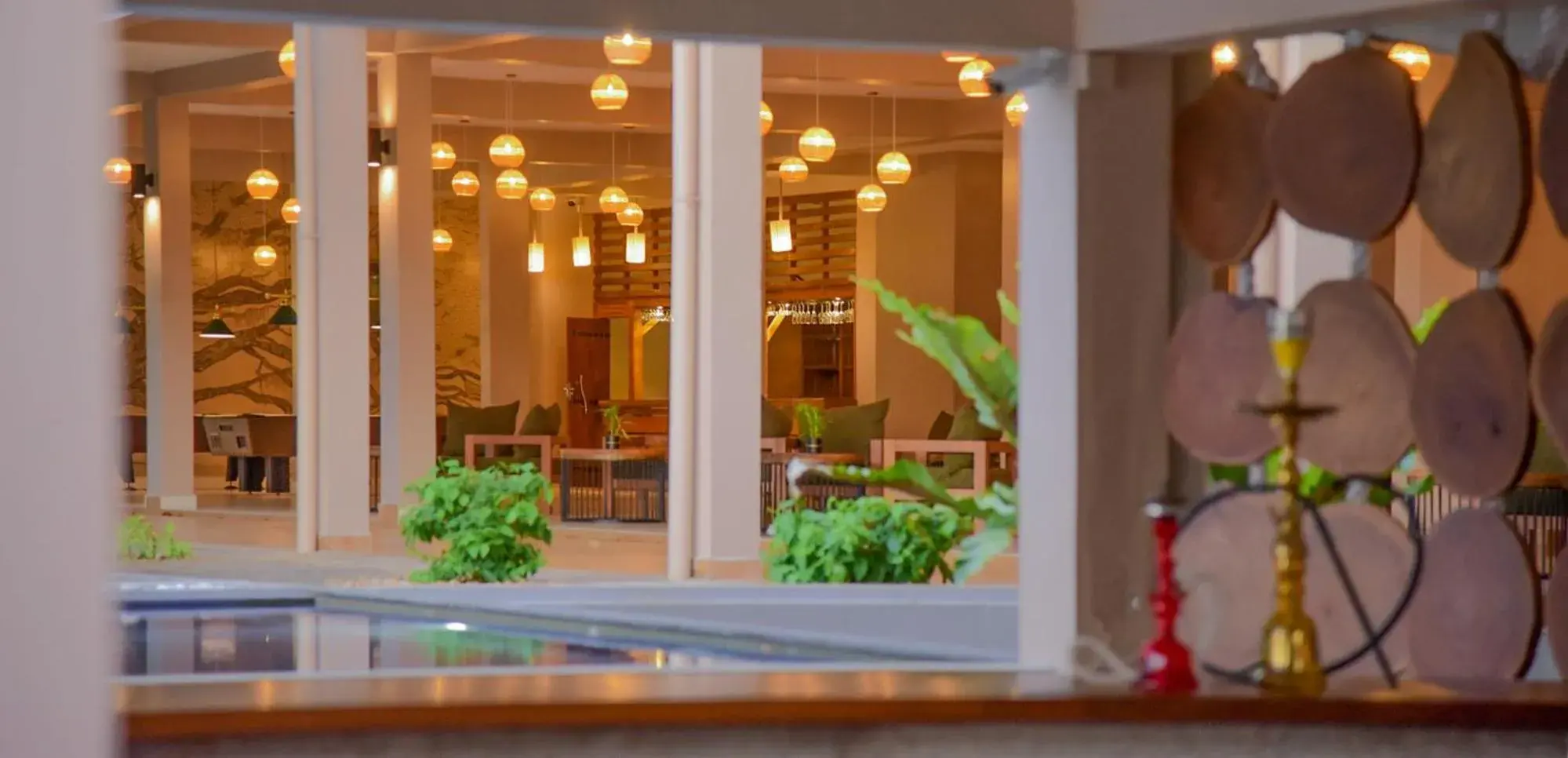 Lounge or bar in Breeze Pasikudah Lounge or bar in Breeze Pasikudah