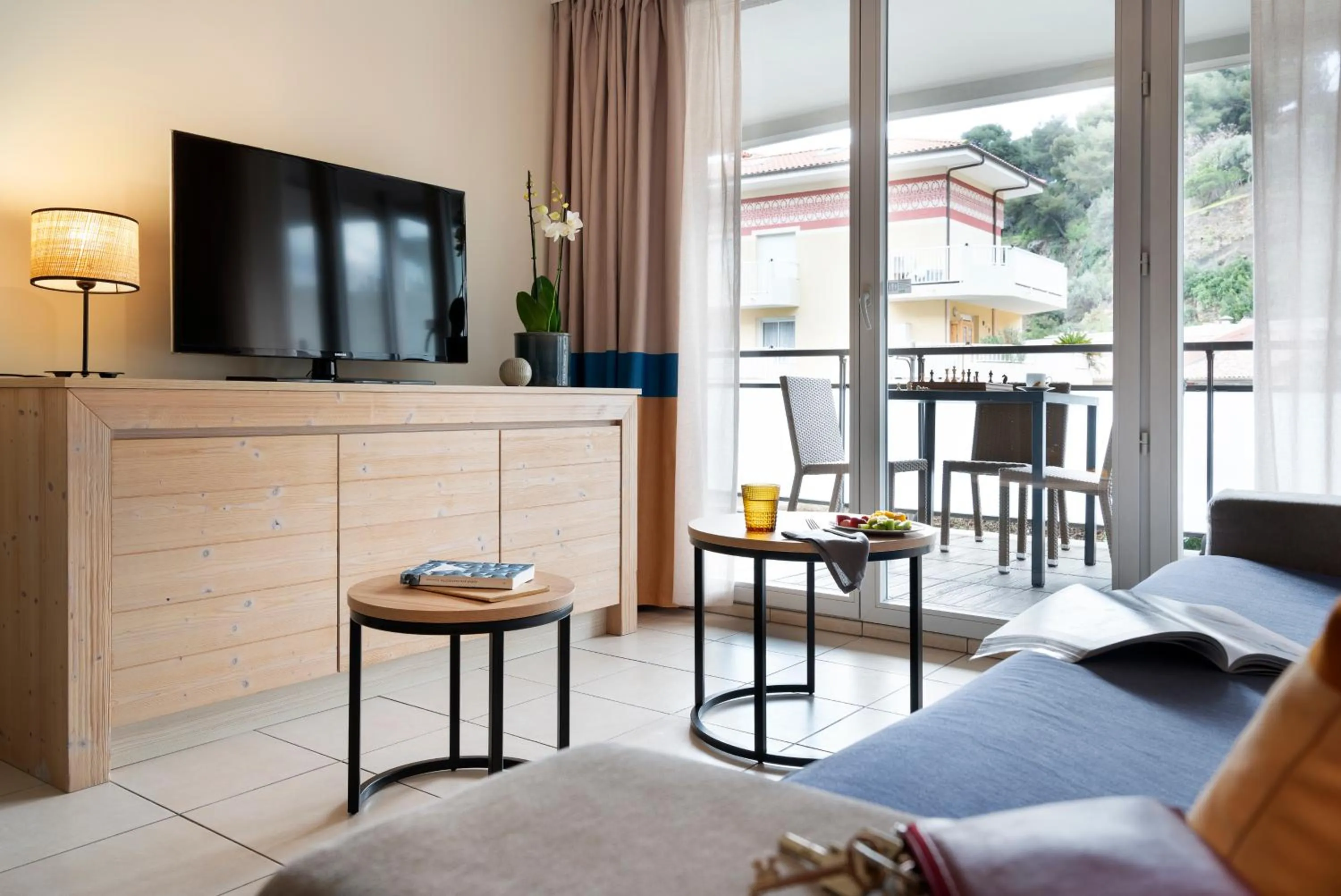 Communal lounge/ TV room in Résidence Pierre & Vacances Premium Julia Augusta