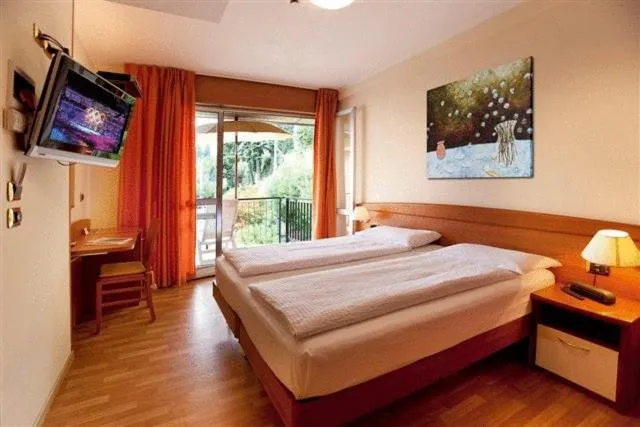 Bedroom in Ambienthotel Spiaggia