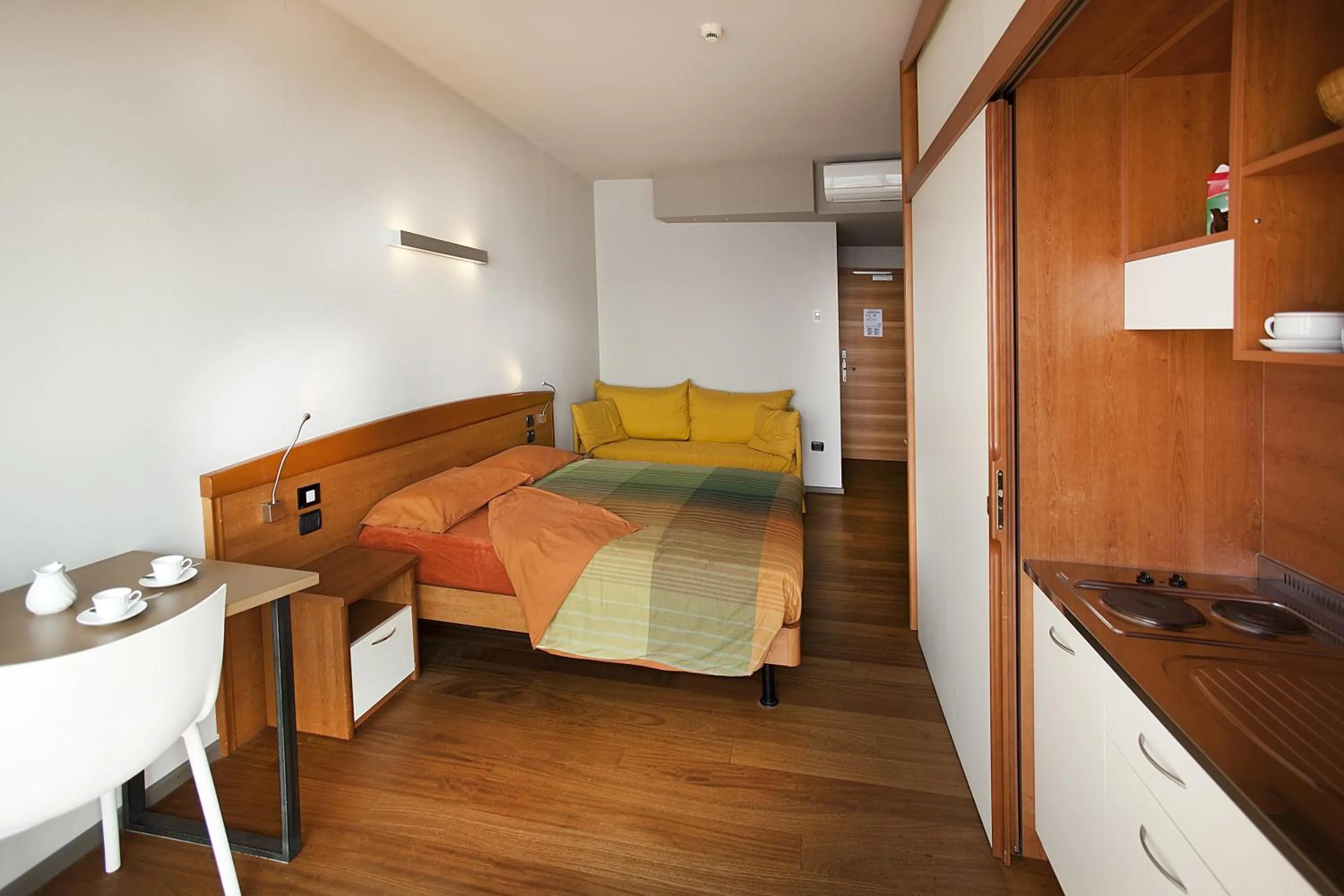 Bedroom in Ambienthotel Spiaggia