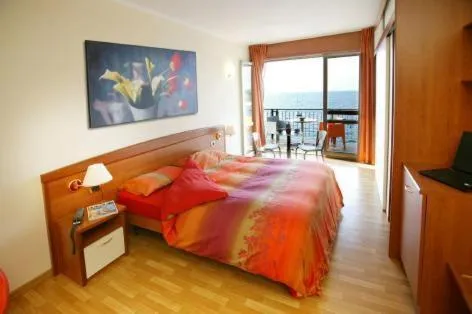 Bedroom in Ambienthotel Spiaggia