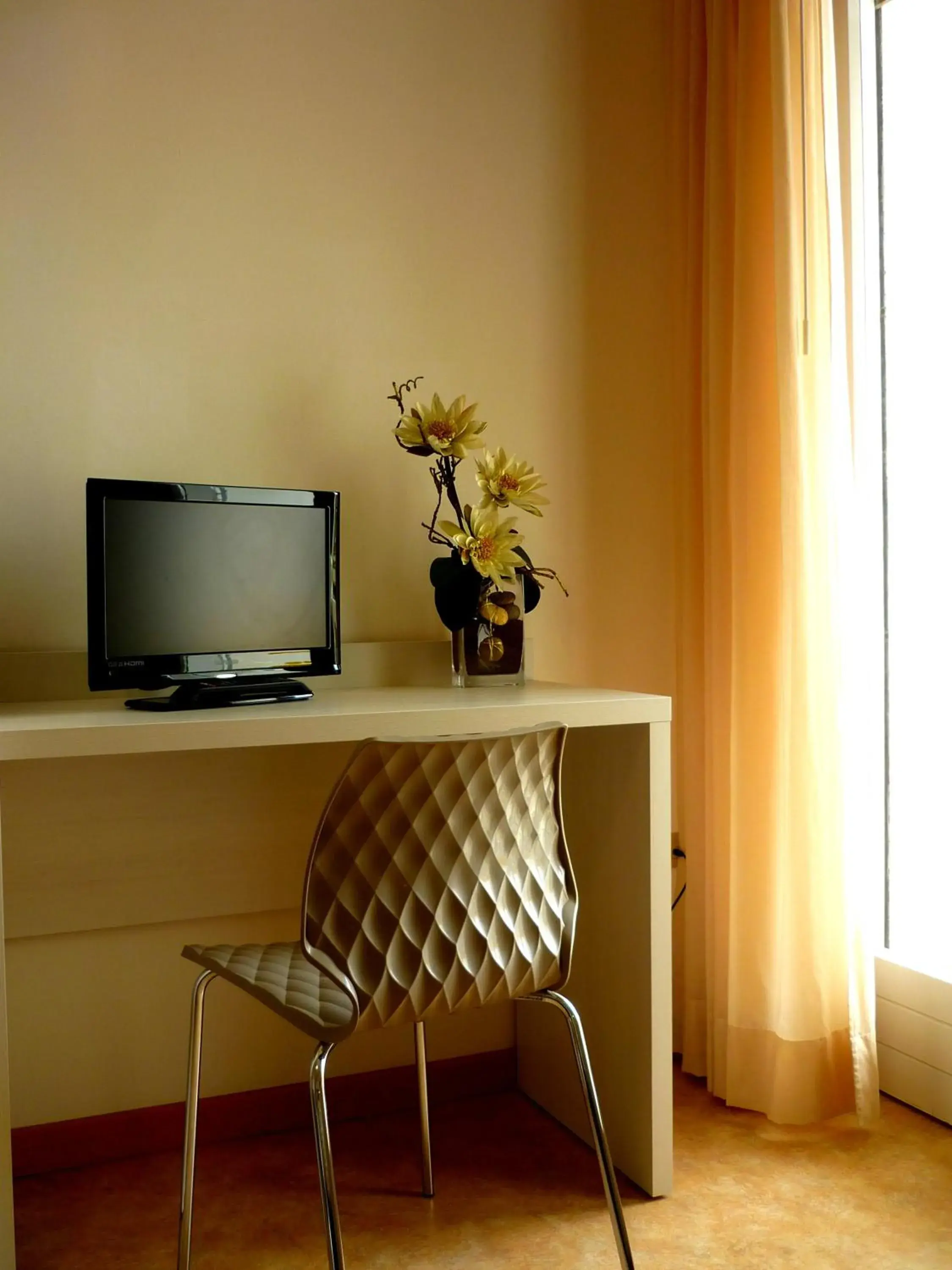 Bedroom, TV/Entertainment Center in Hotel Solemare