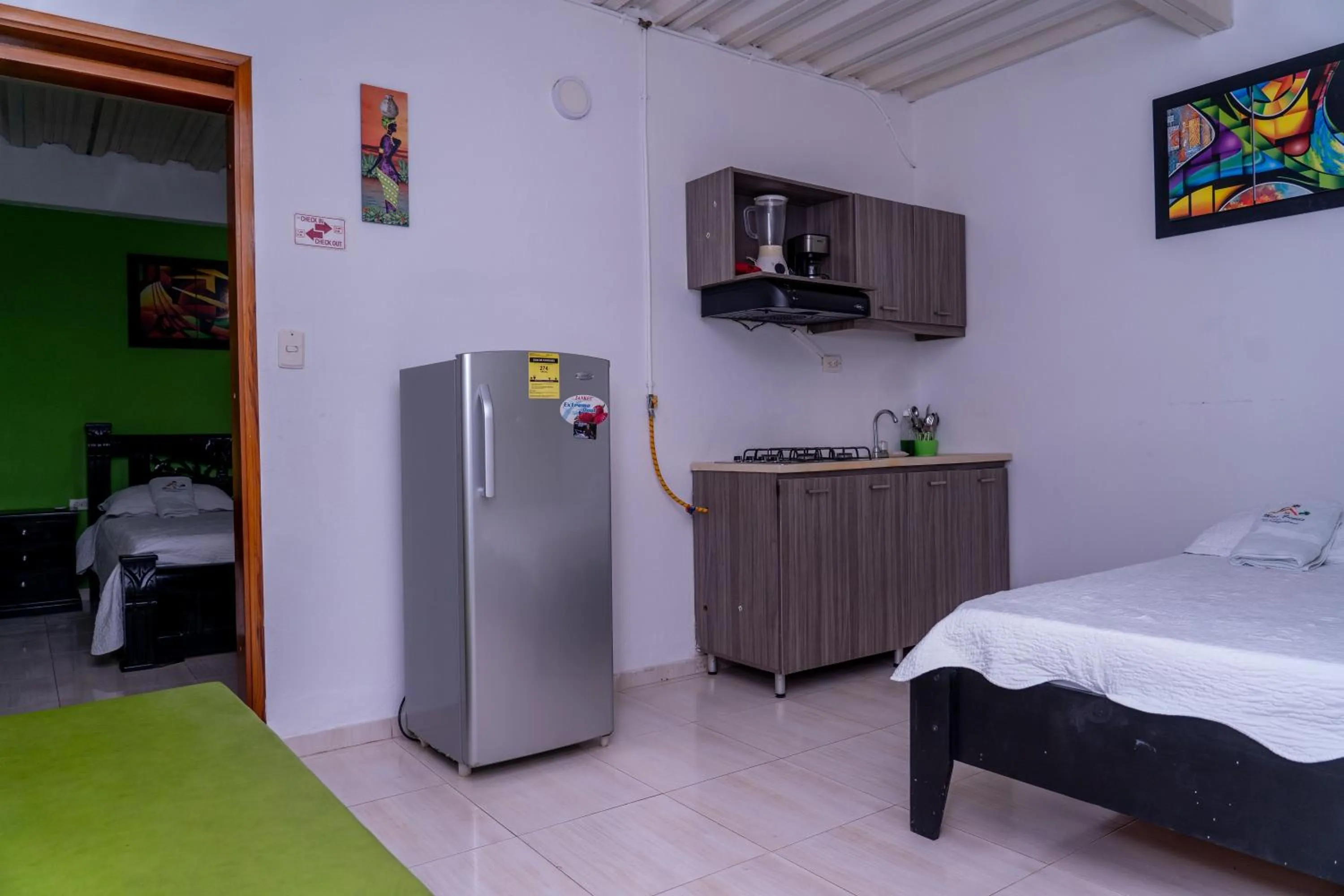 Kitchen or kitchenette, Bed in Apartamento Miss Brigida
