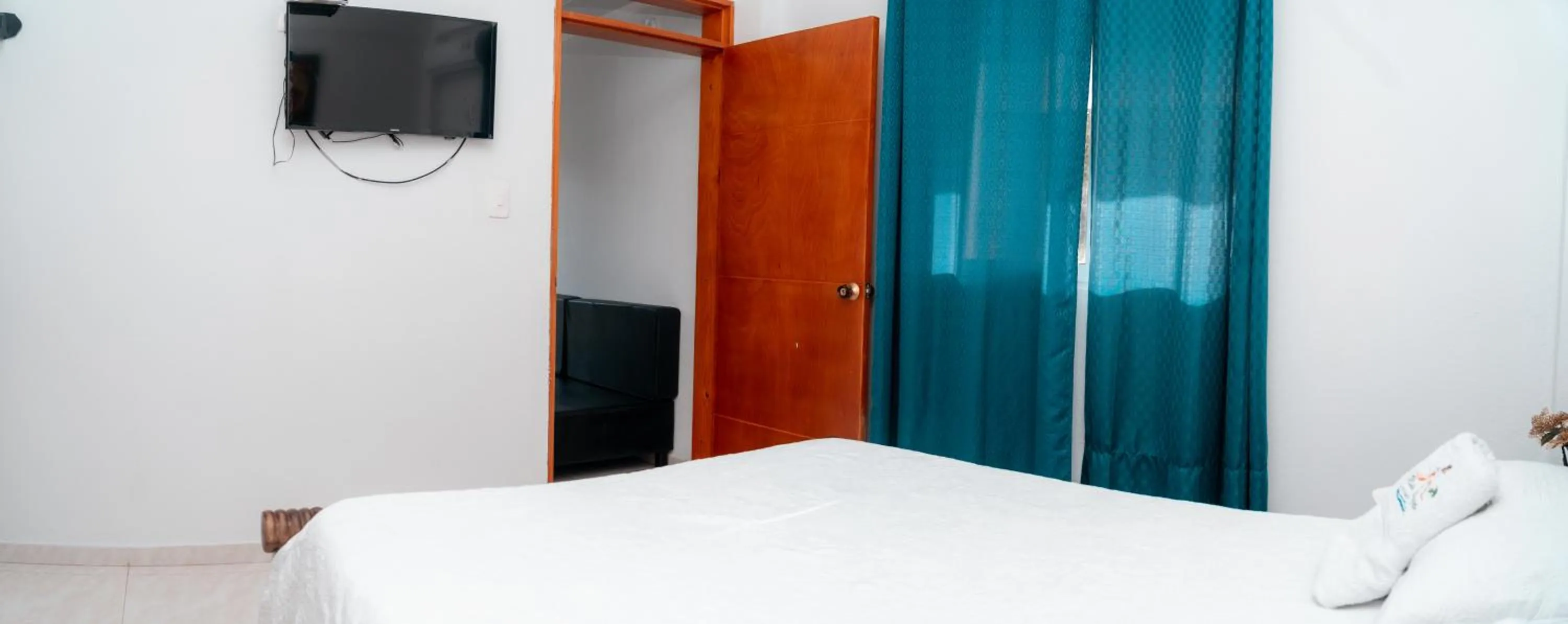 TV and multimedia, Bed in Apartamento Miss Brigida