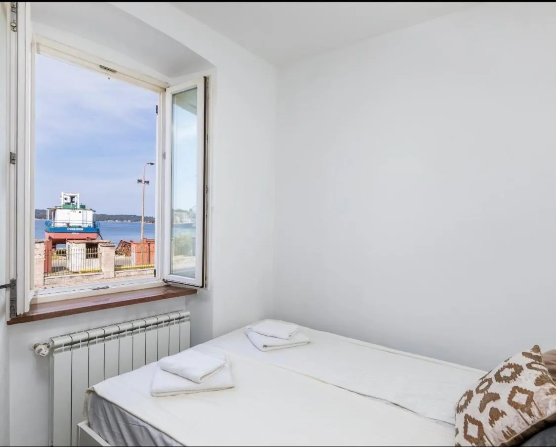 Bed in Apartment Augusto - Sea view
