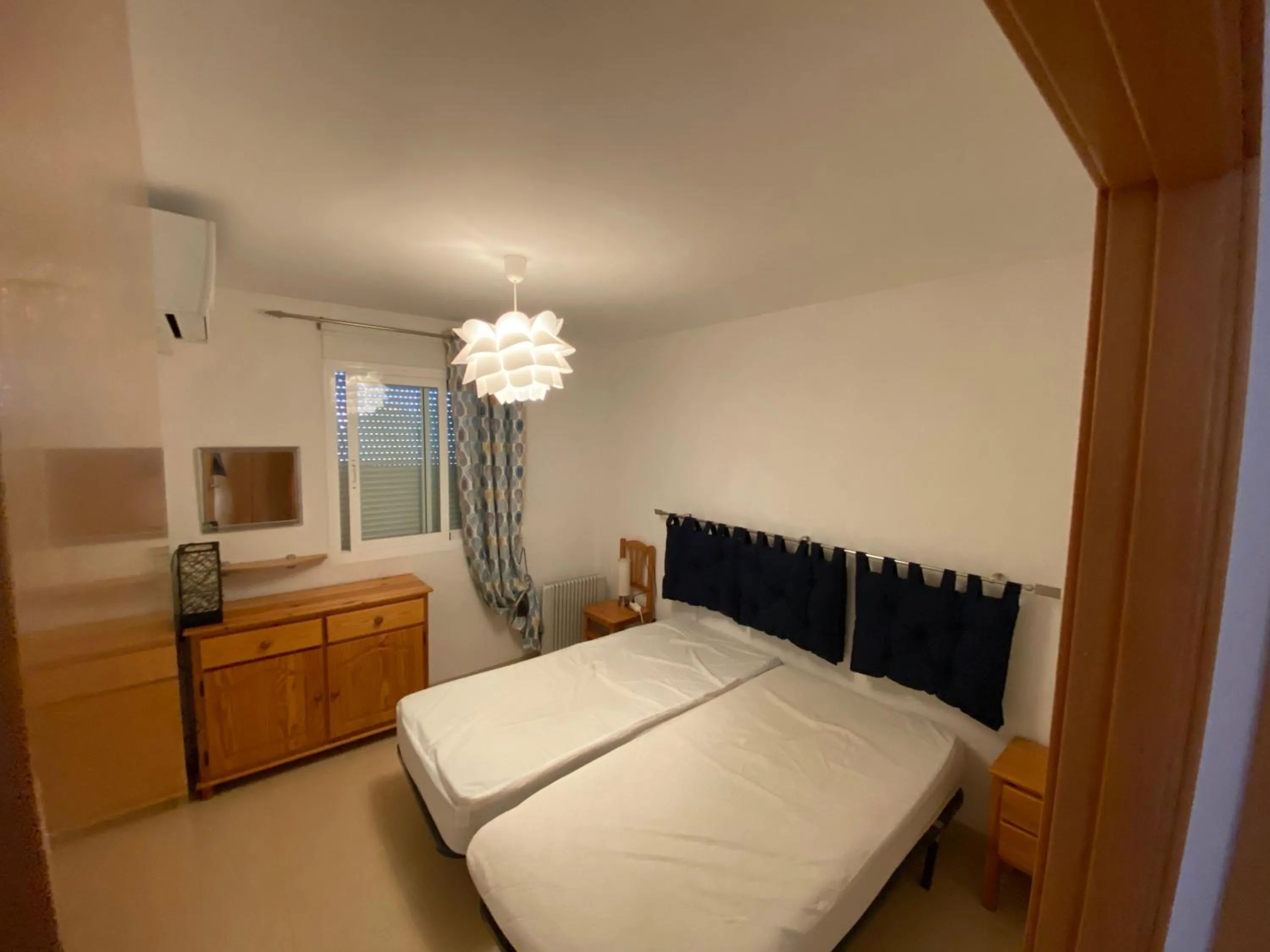 Bed in Apartamentos Punta Canaret Altamar