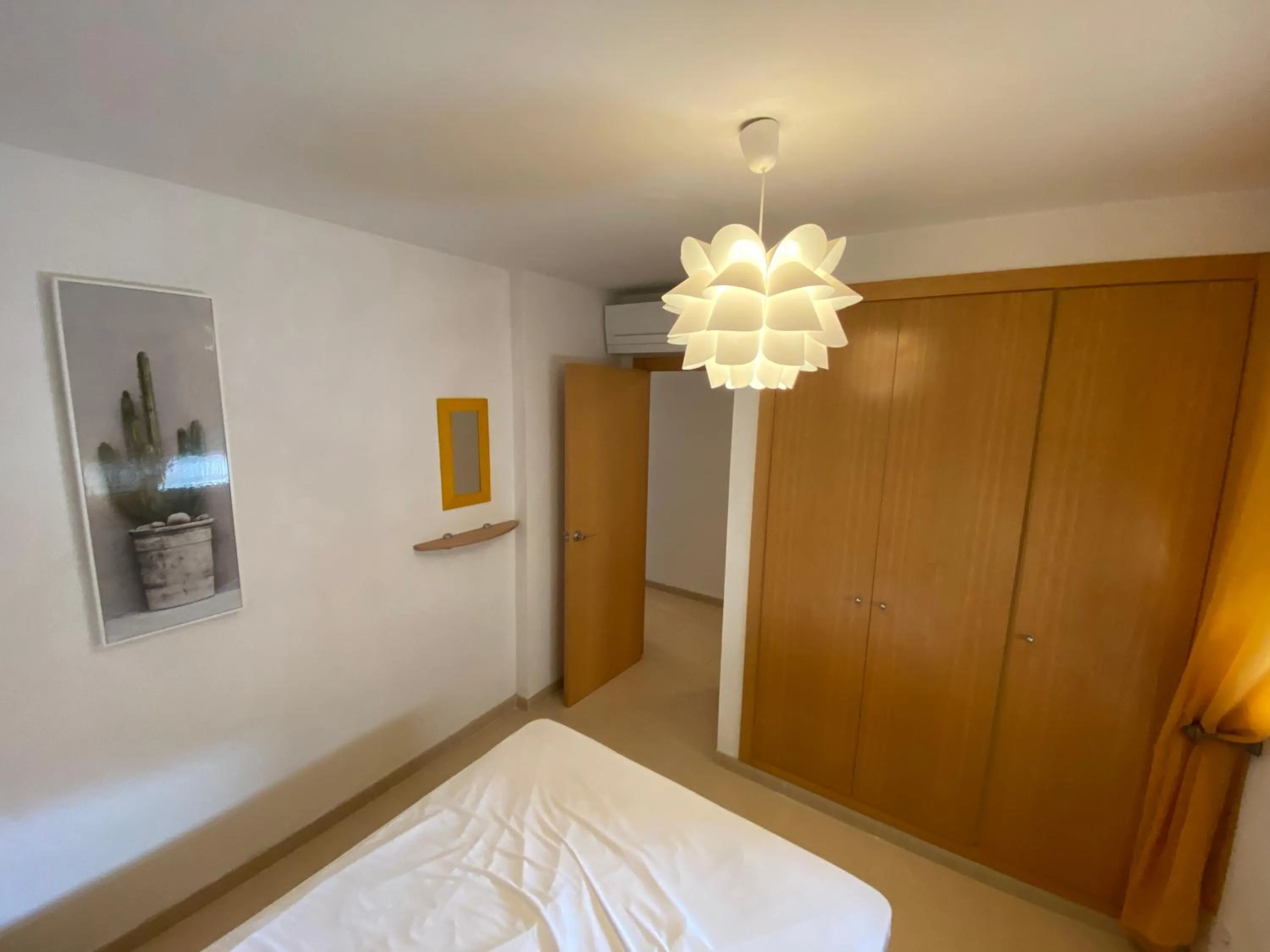 Bed in Apartamentos Punta Canaret Altamar