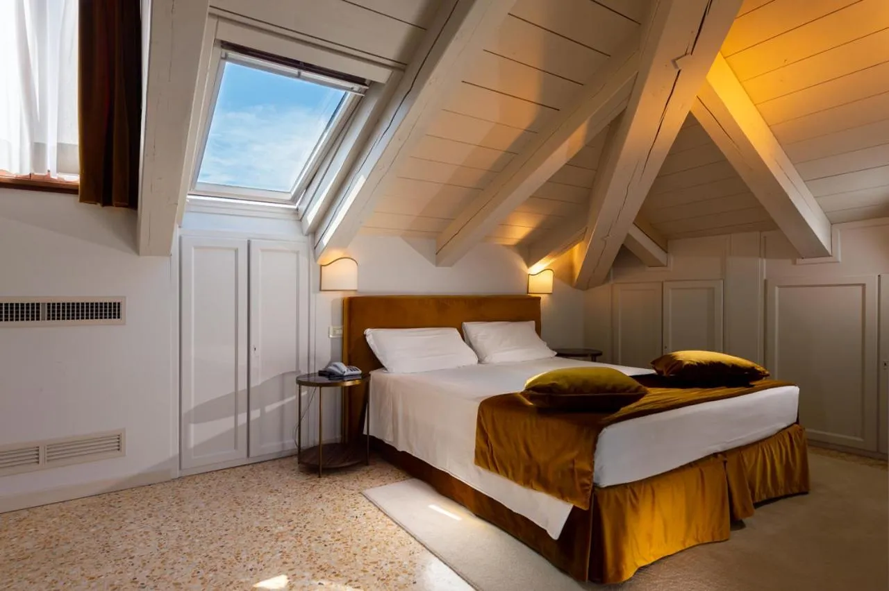 Bed in Hotel Tiziano