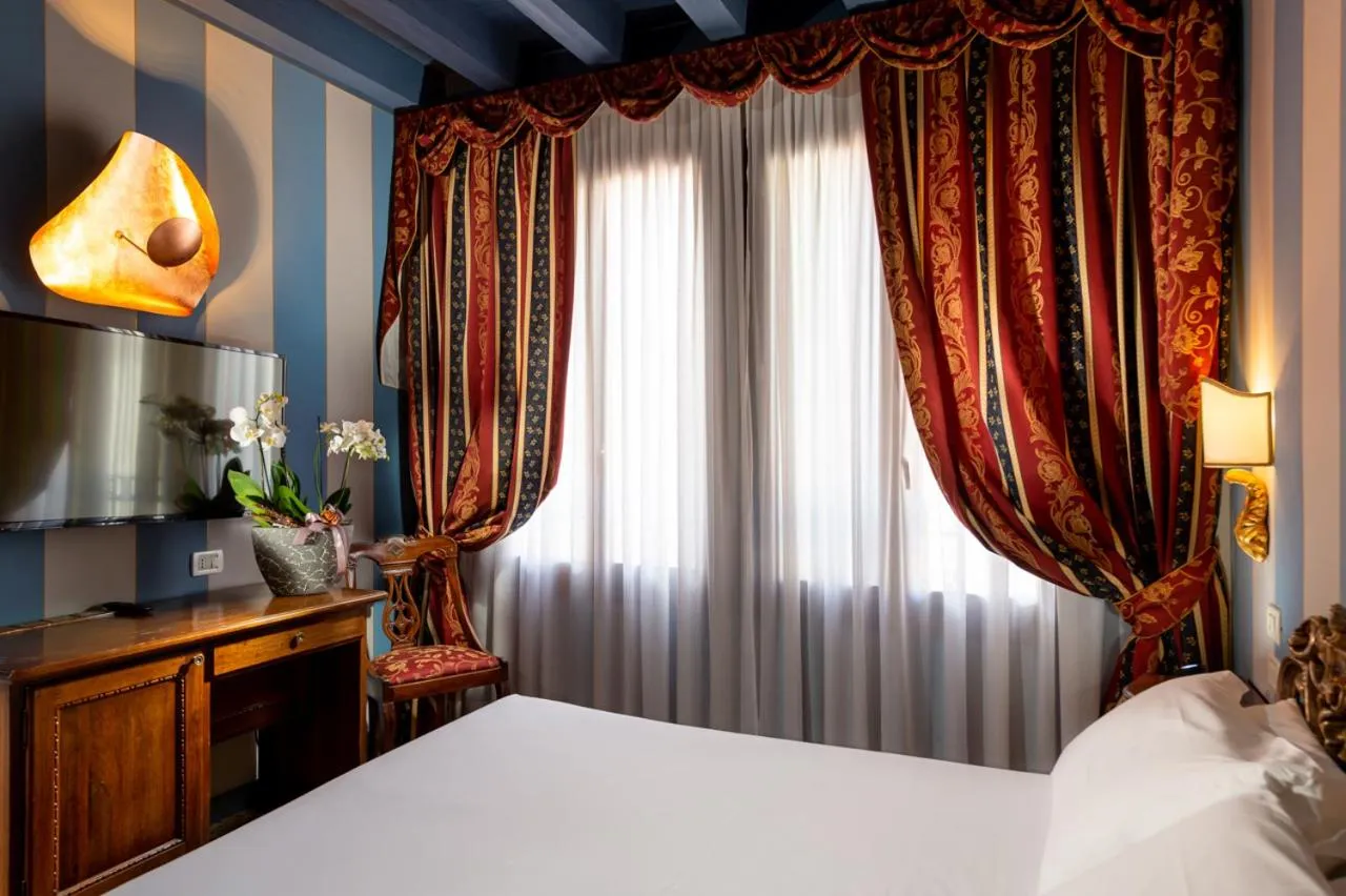 Bed in Hotel Tiziano