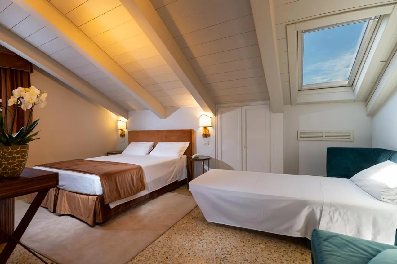 Bed in Hotel Tiziano