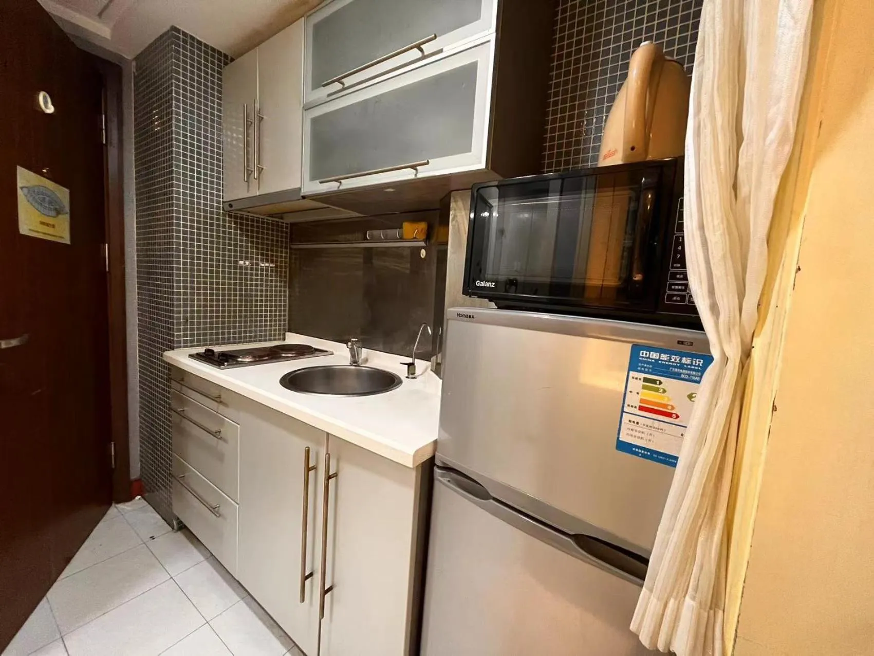 Kitchen or kitchenette in Shanghai Jiarong Hotel Apartment