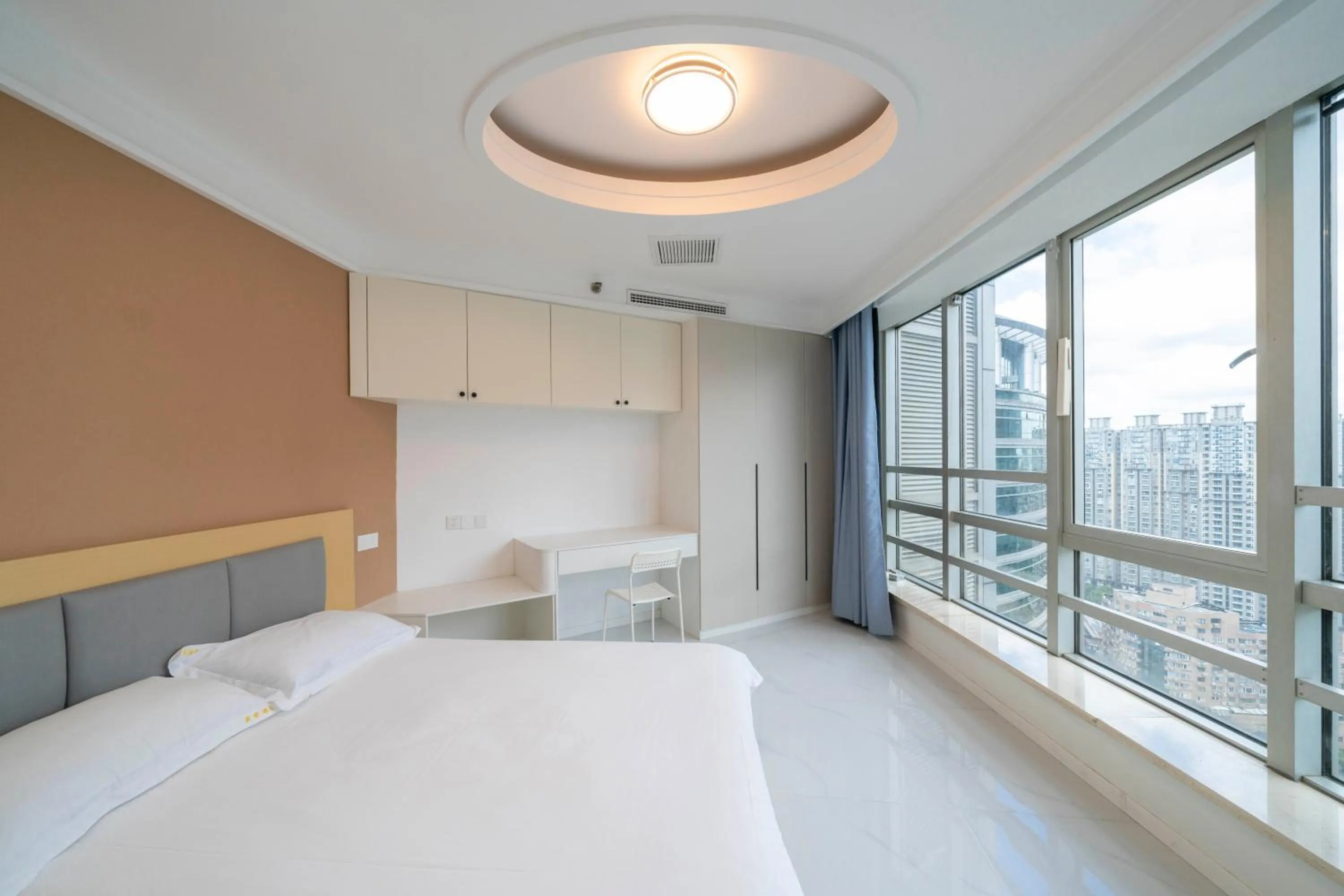 Bed in Shanghai Jiarong Hotel Apartment