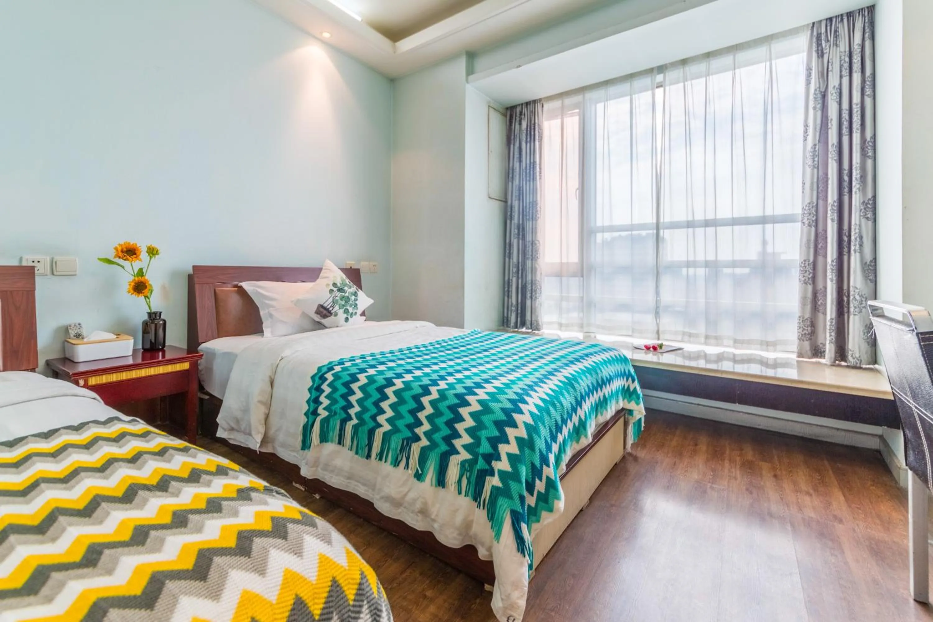 Bed in Shanghai Jiarong Hotel Apartment