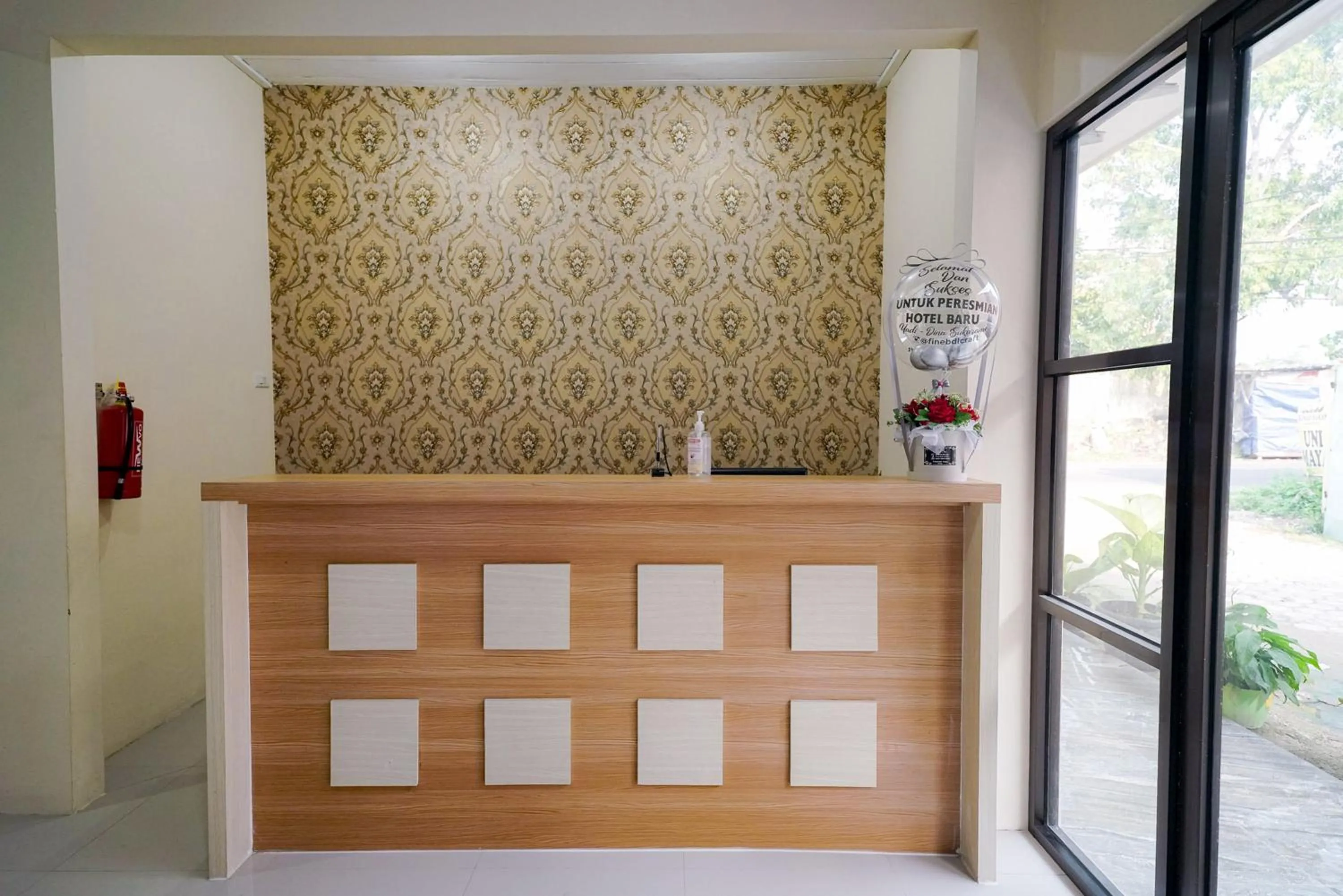 Lobby or reception in Urbanview Hotel St Faustina Lampung by RedDoorz