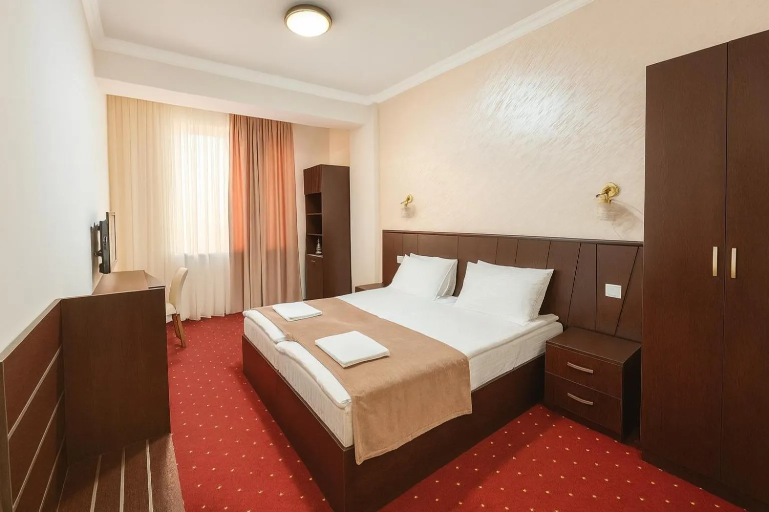 Bed in Anga Yerevan Hotel