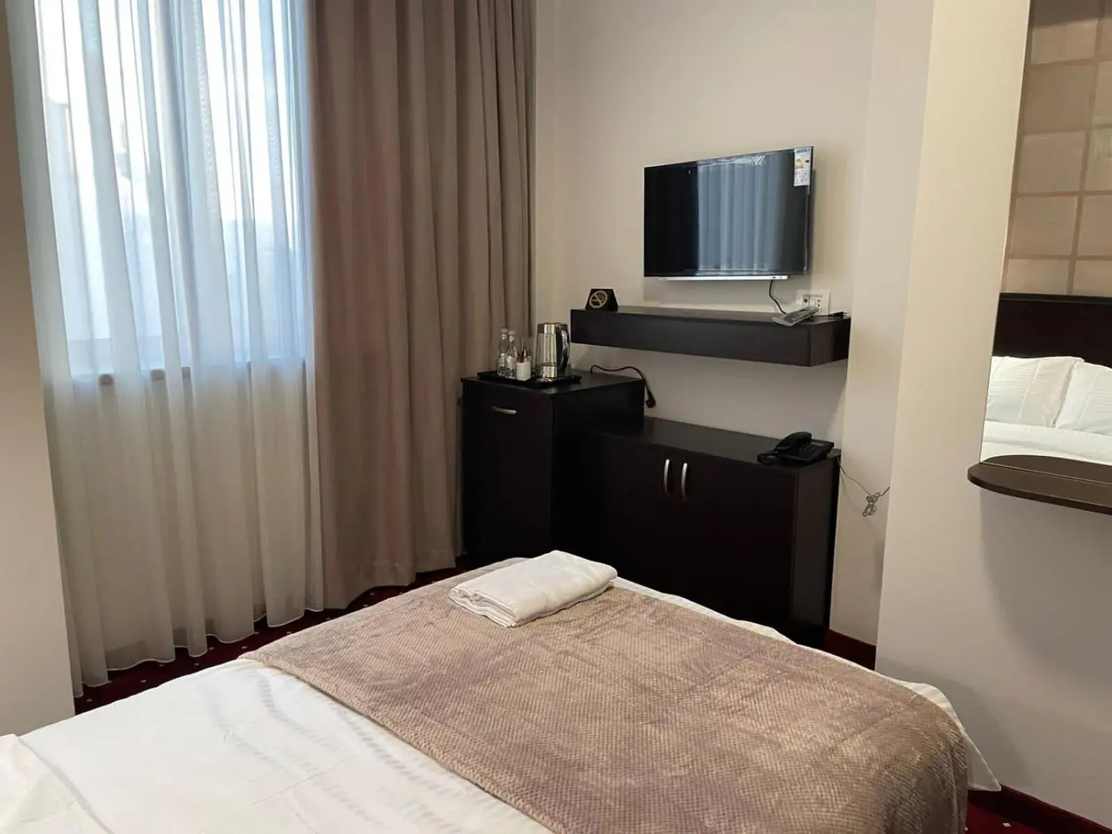 TV and multimedia, Bed in Anga Yerevan Hotel TV and multimedia, Bed in Anga Yerevan Hotel