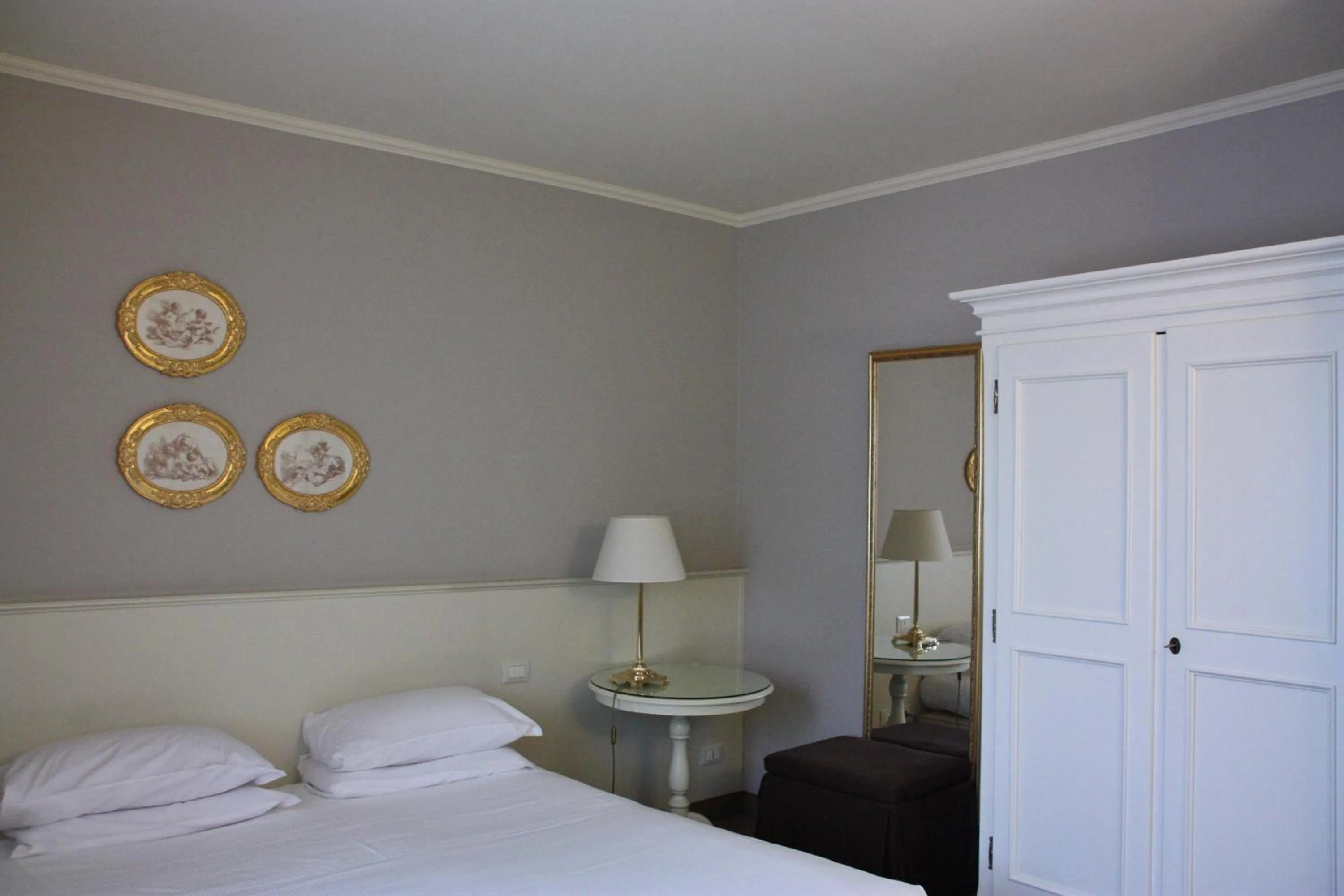 Bed in Hotel Canon d'Oro