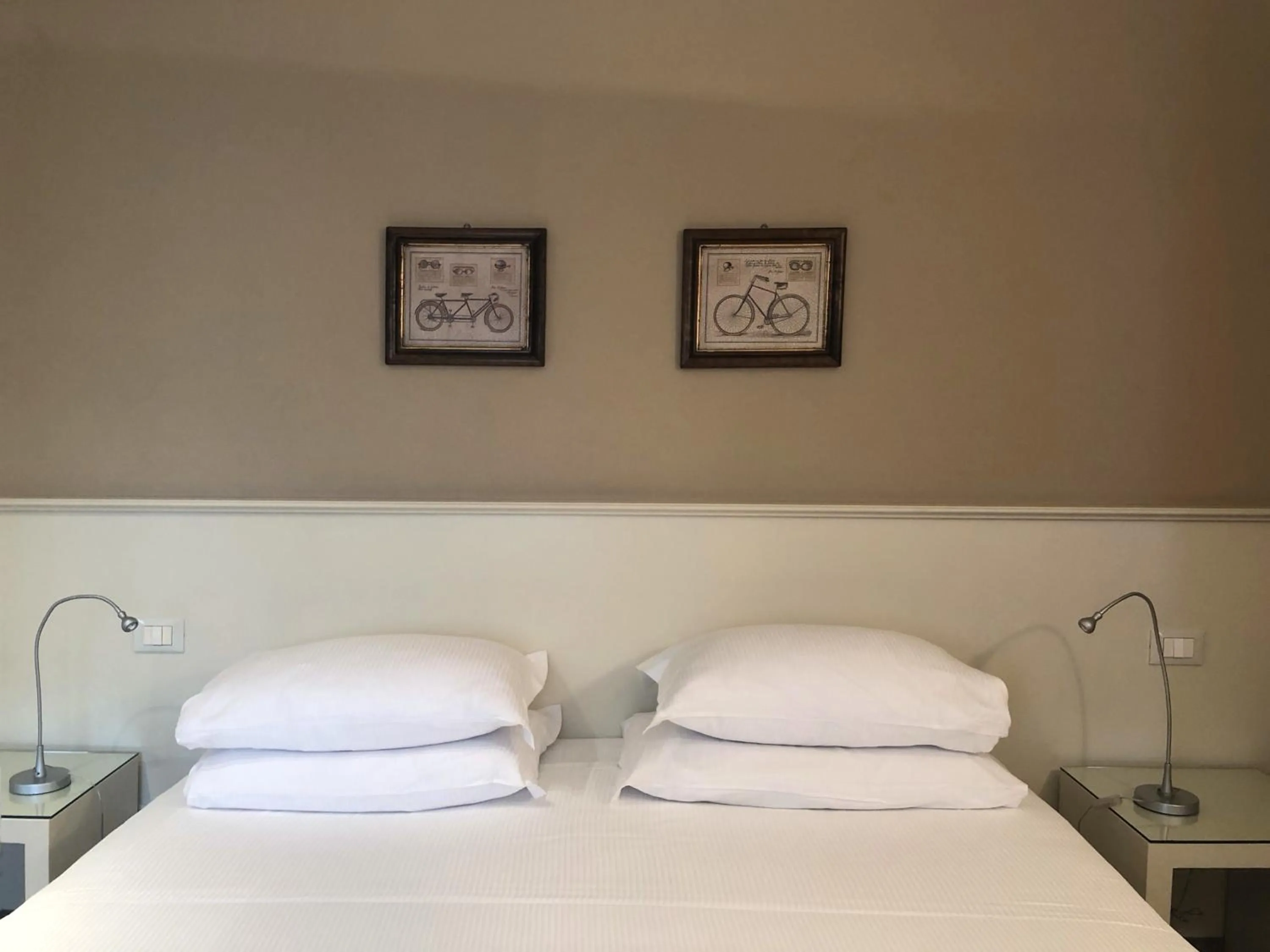 Bed in Hotel Canon d'Oro