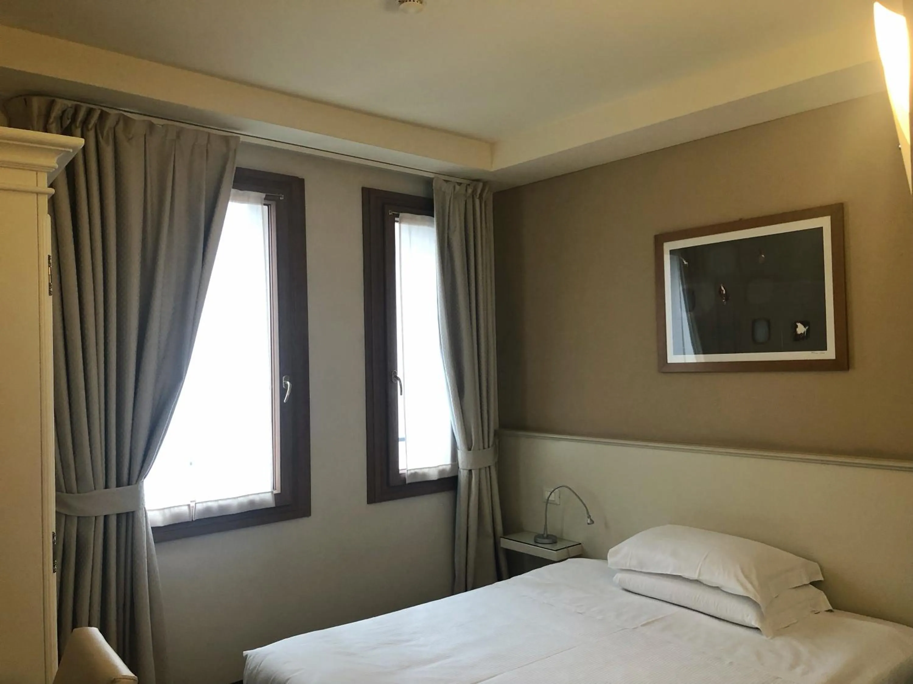 Bed in Hotel Canon d'Oro