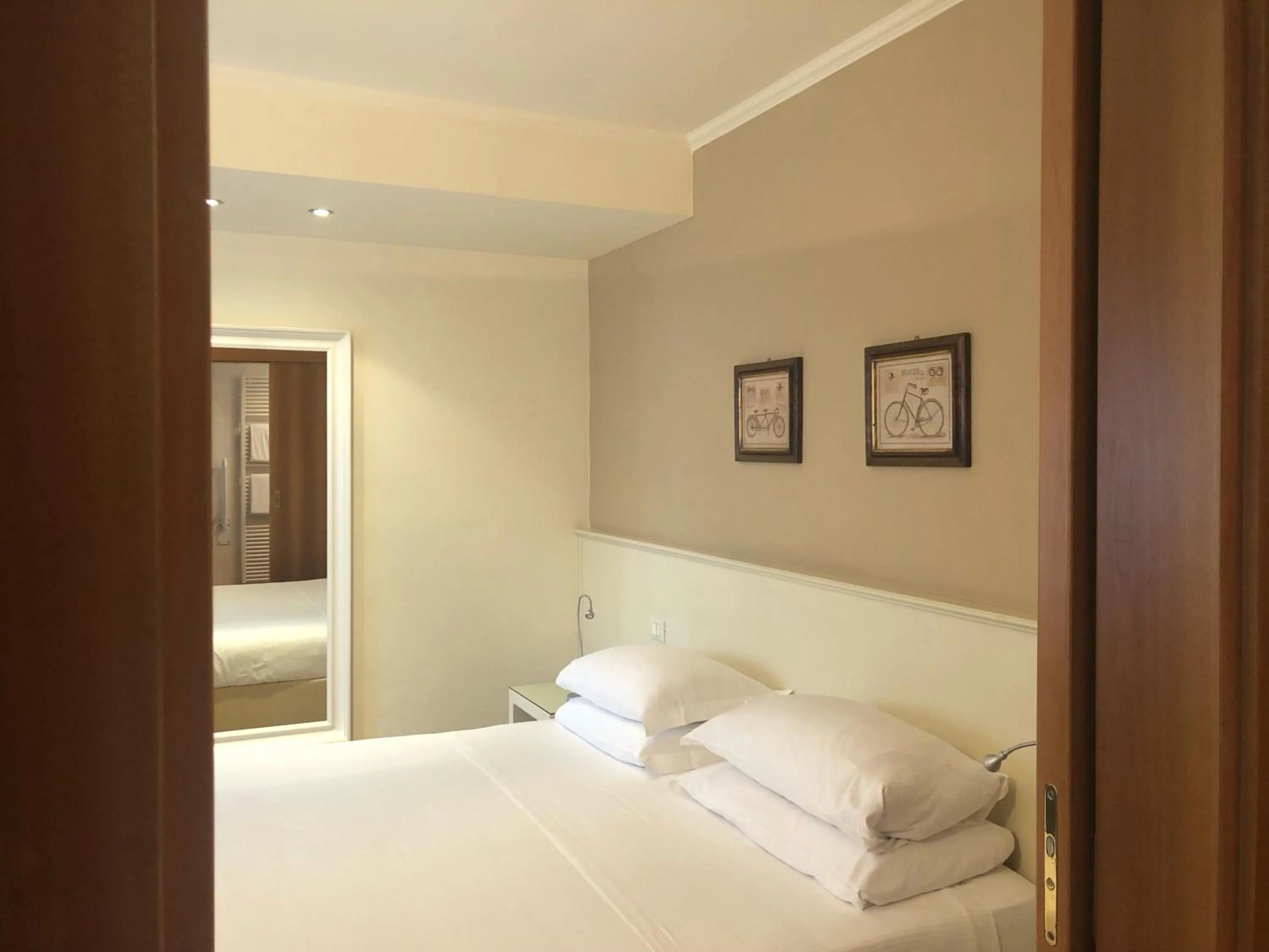 Bed in Hotel Canon d'Oro