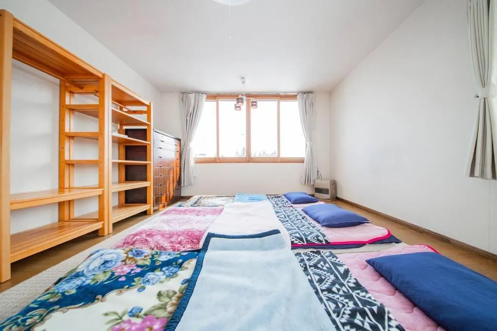Bedroom, Bed in GUESTHOUSE CHIYOGAOKA