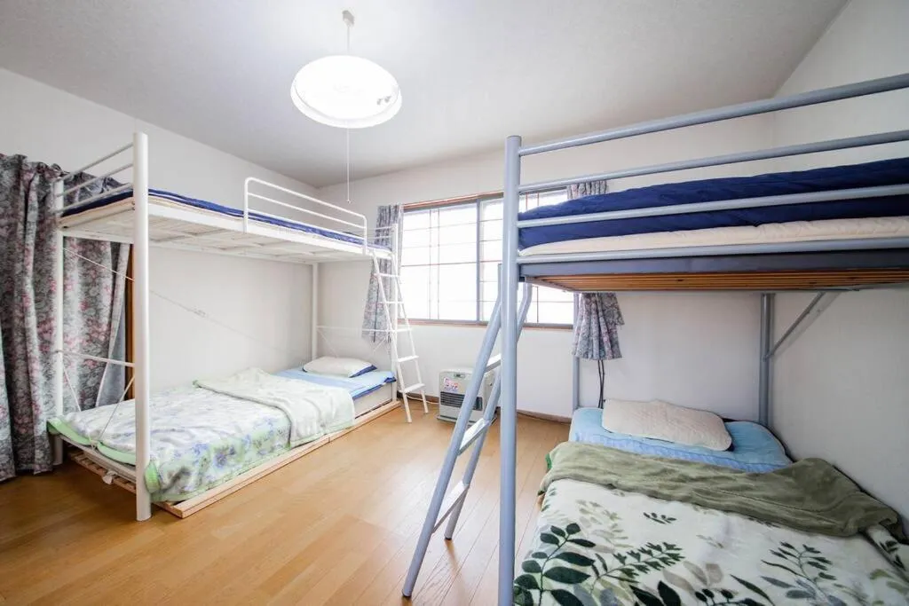 Bedroom, Bed in GUESTHOUSE CHIYOGAOKA