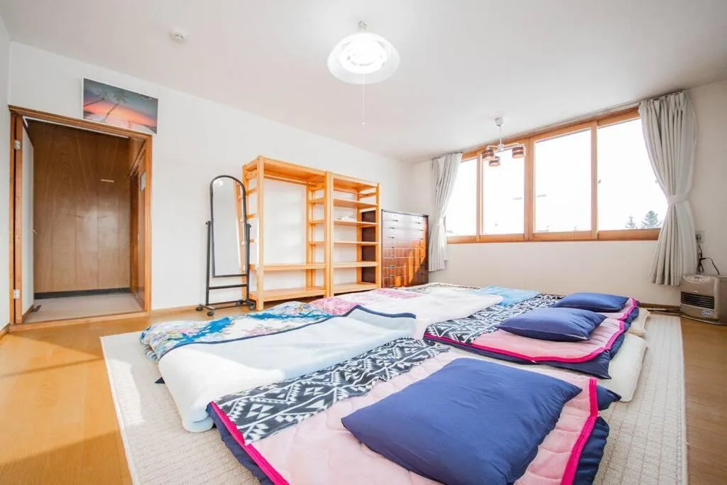 Bedroom, Bed in GUESTHOUSE CHIYOGAOKA