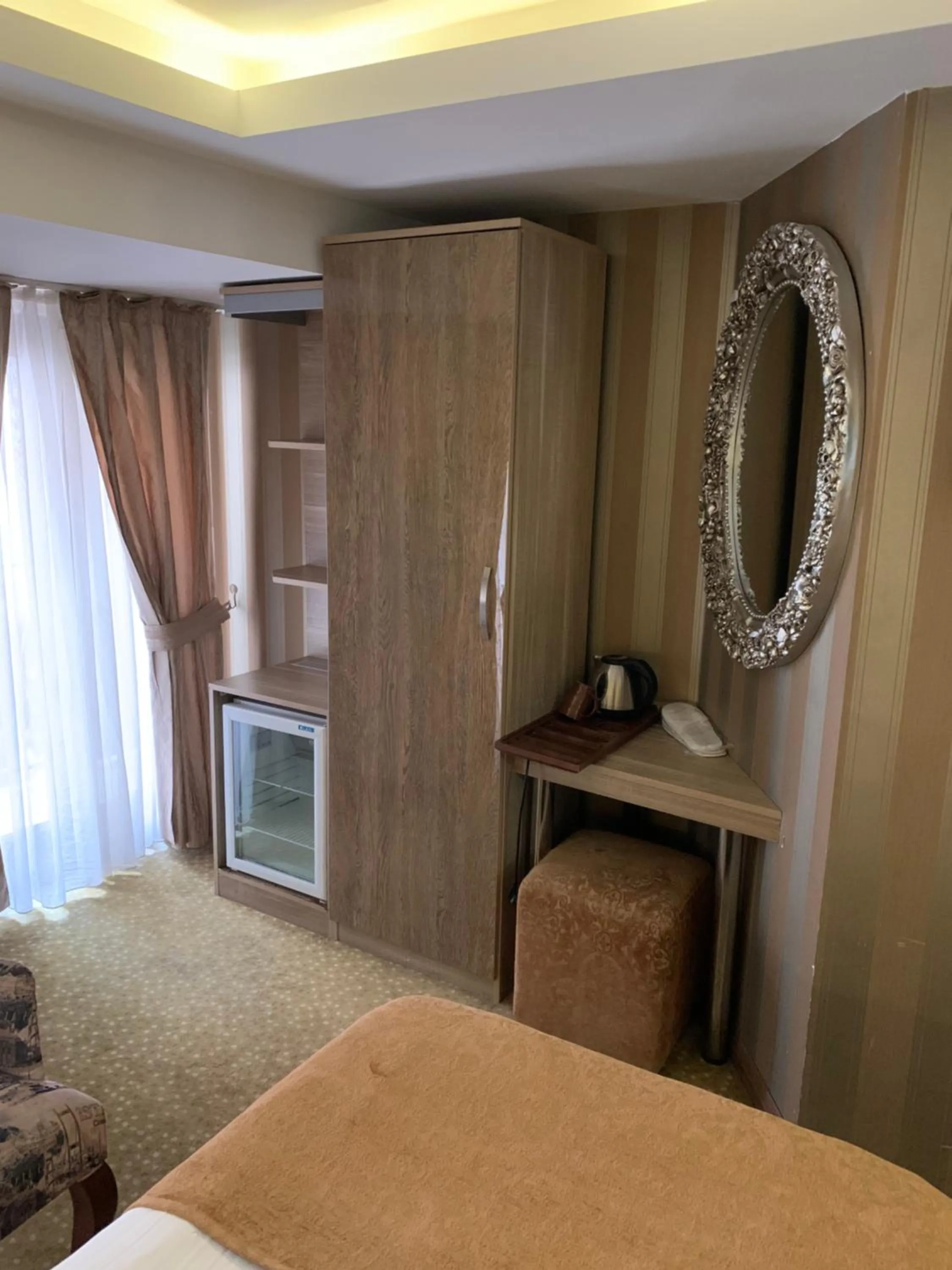 Seating area, Bed in Golden Rain Hotel Old City