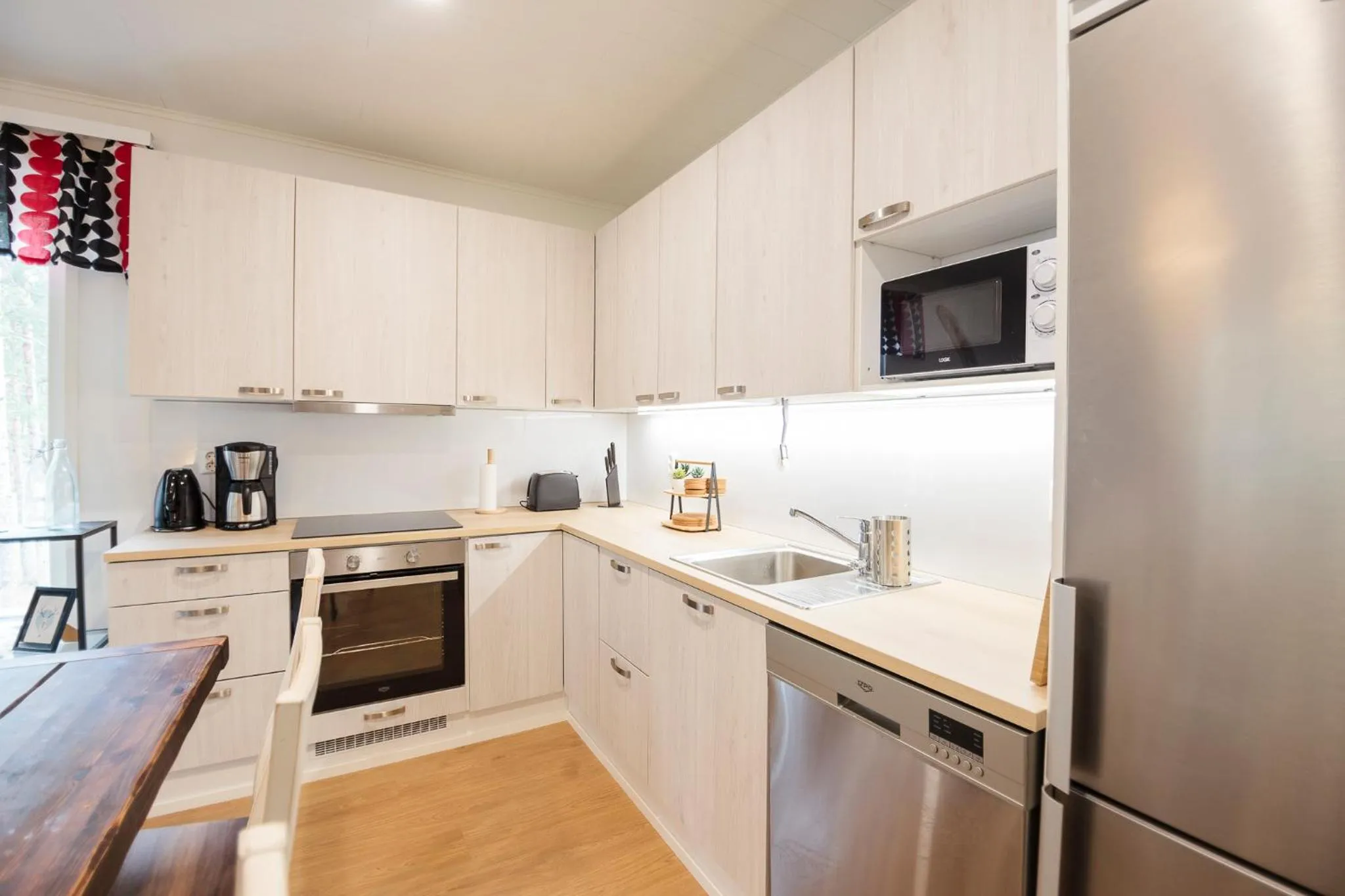 kitchen in Tuomenkartano Apartments by Hiekka Booking