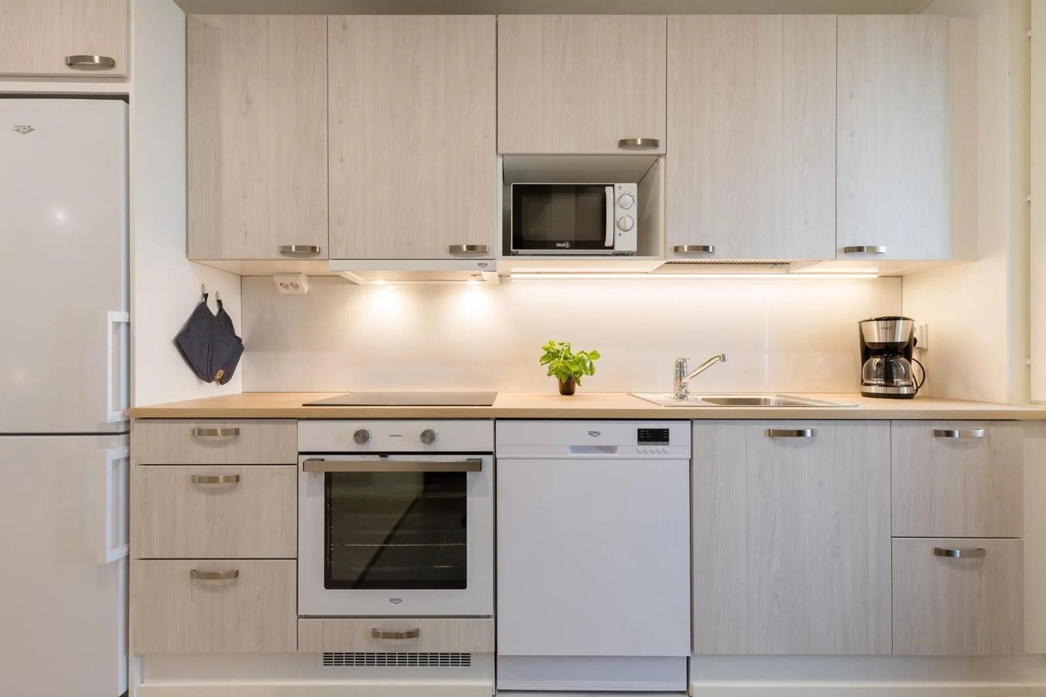 kitchen in Tuomenkartano Apartments by Hiekka Booking