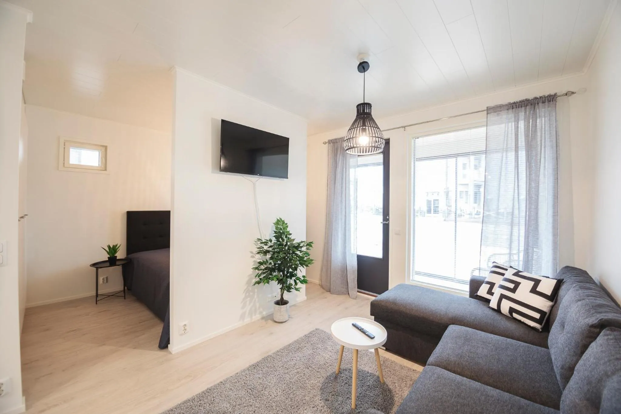 Living room in Tuomenkartano Apartments by Hiekka Booking