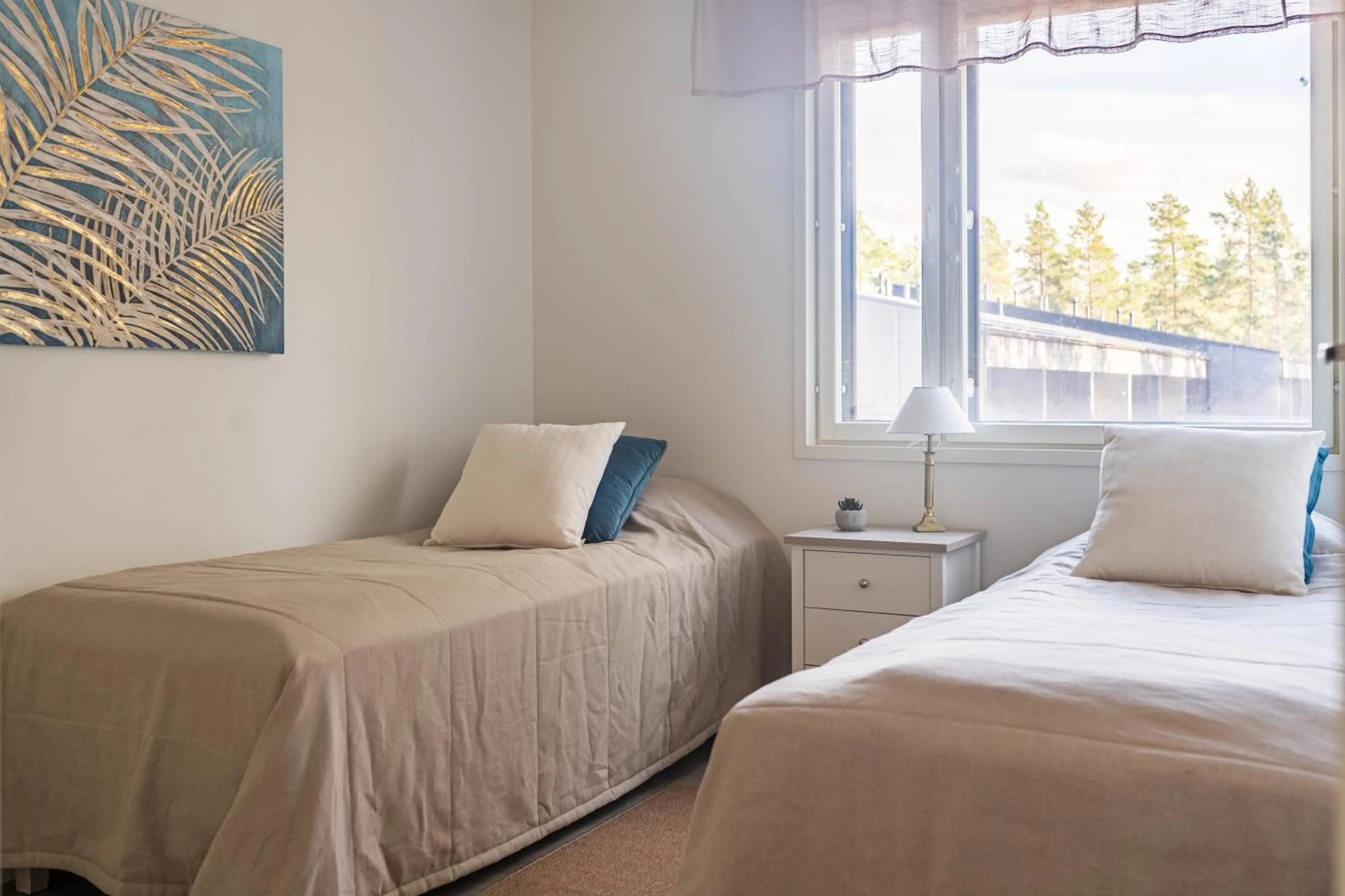 Bedroom, Bed in Tuomenkartano Apartments by Hiekka Booking