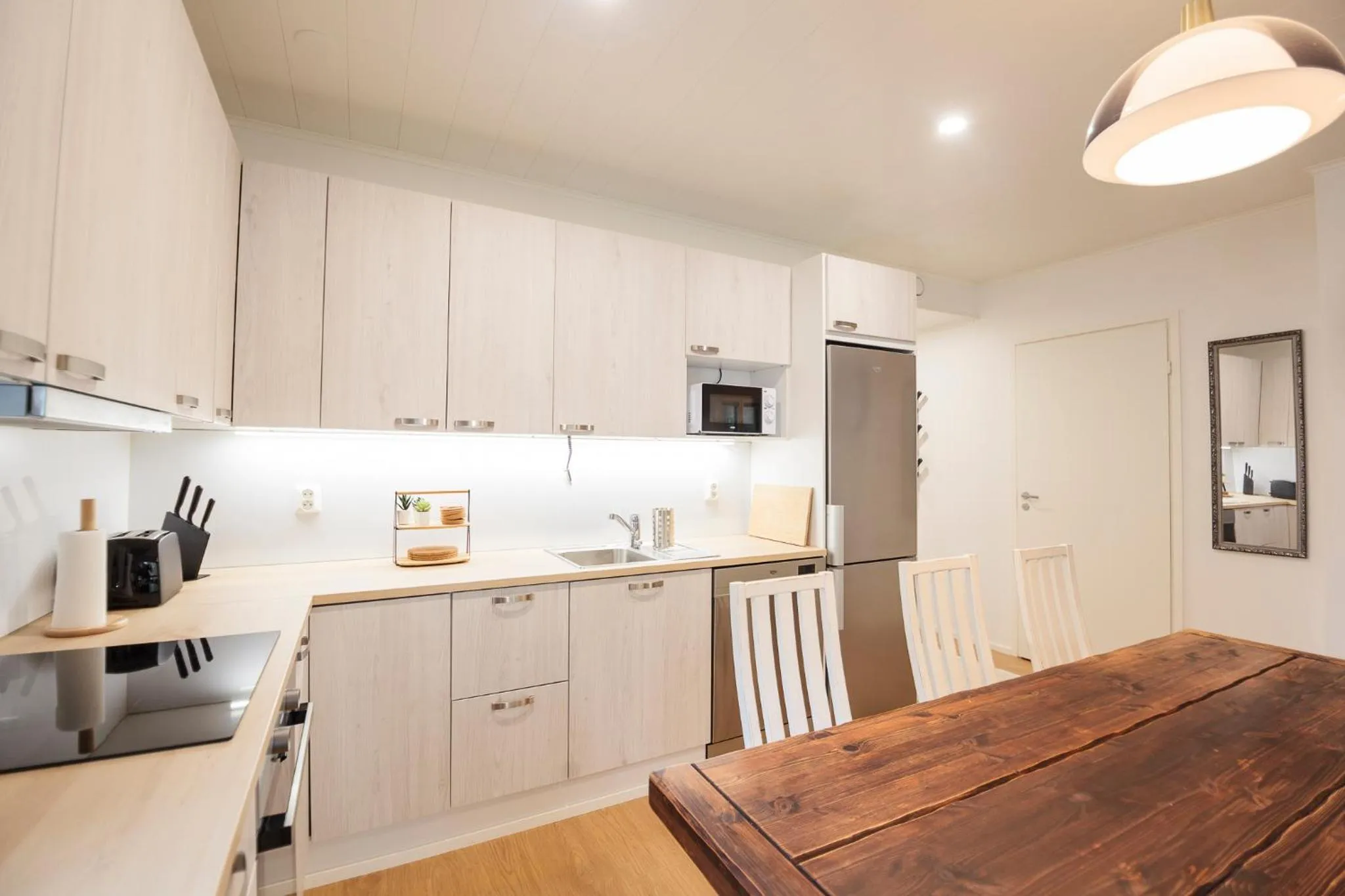 kitchen in Tuomenkartano Apartments by Hiekka Booking