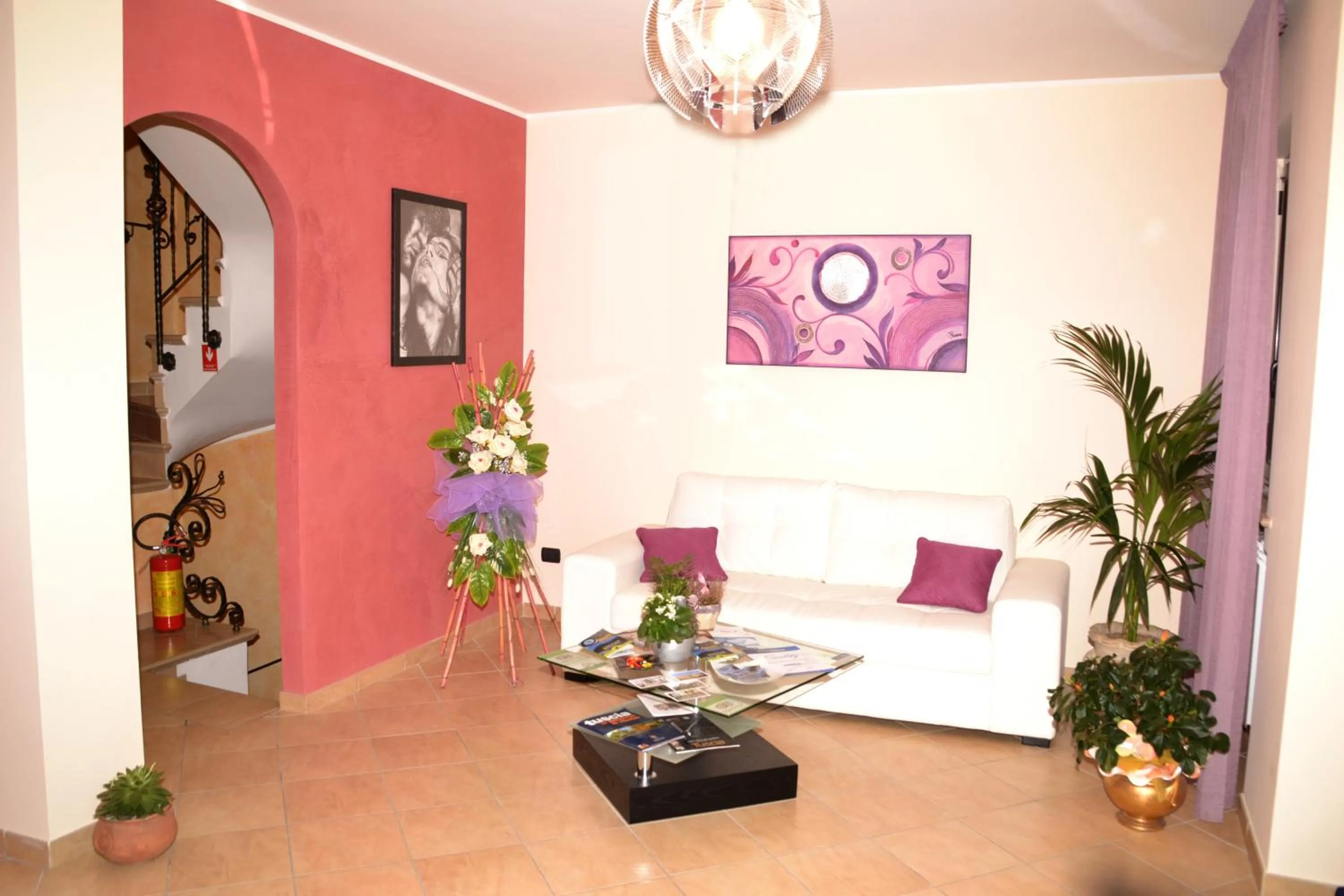 Communal lounge/ TV room in La Baia del Lago