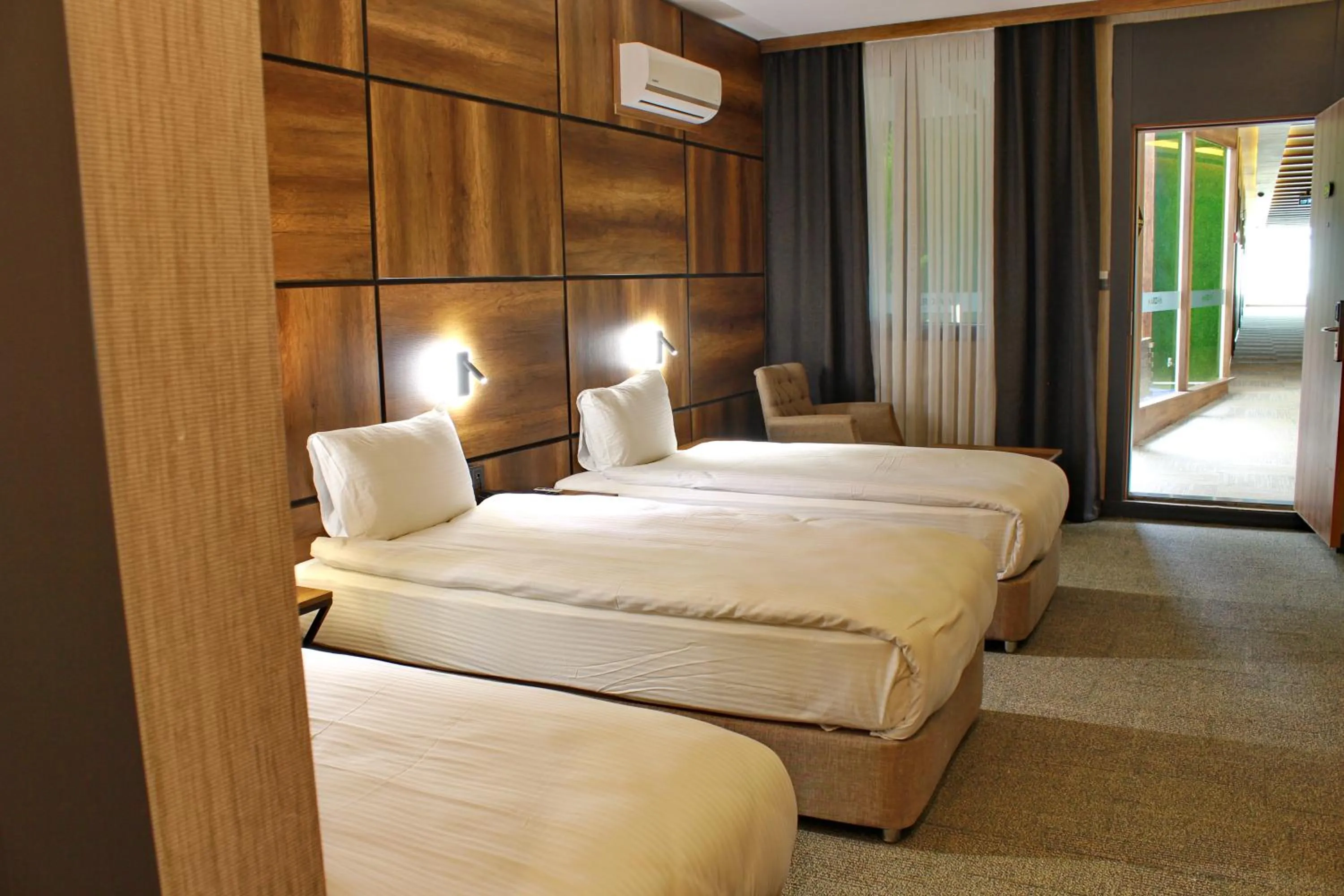Bed in Mardiva Hotel